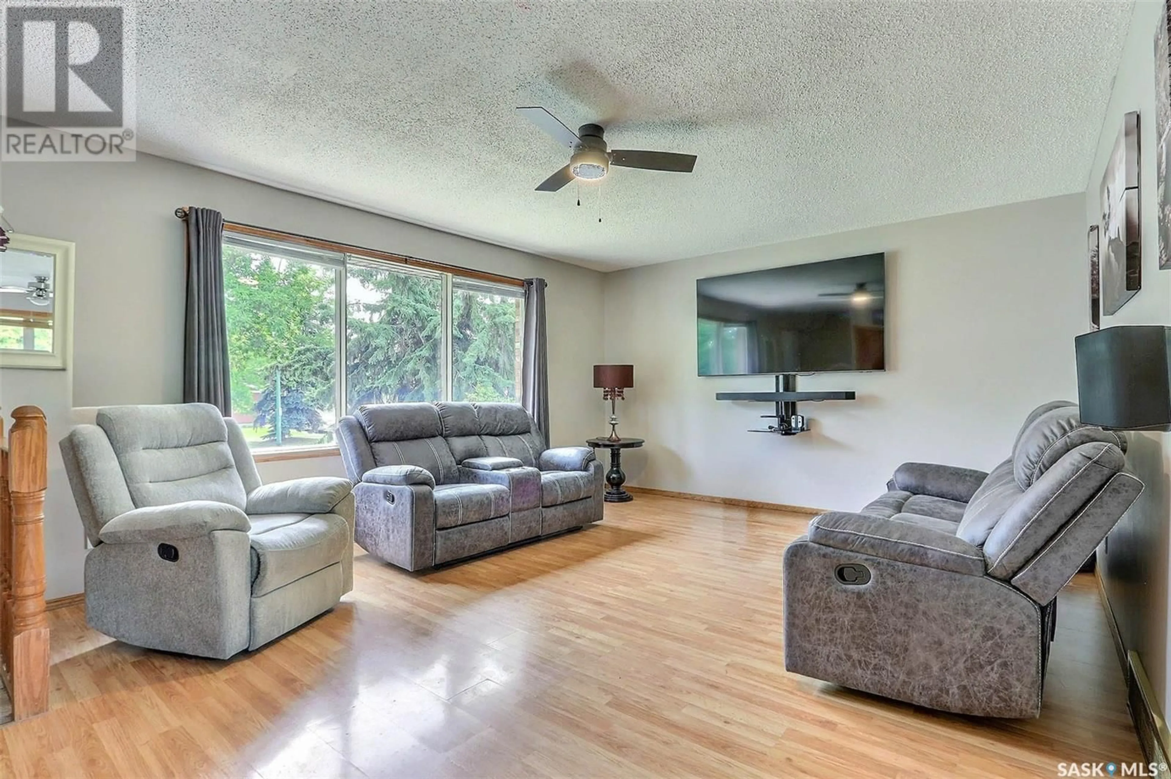 Living room with furniture, wood/laminate floor for 2559 15TH AVENUE, Prince Albert Saskatchewan S6V6H4