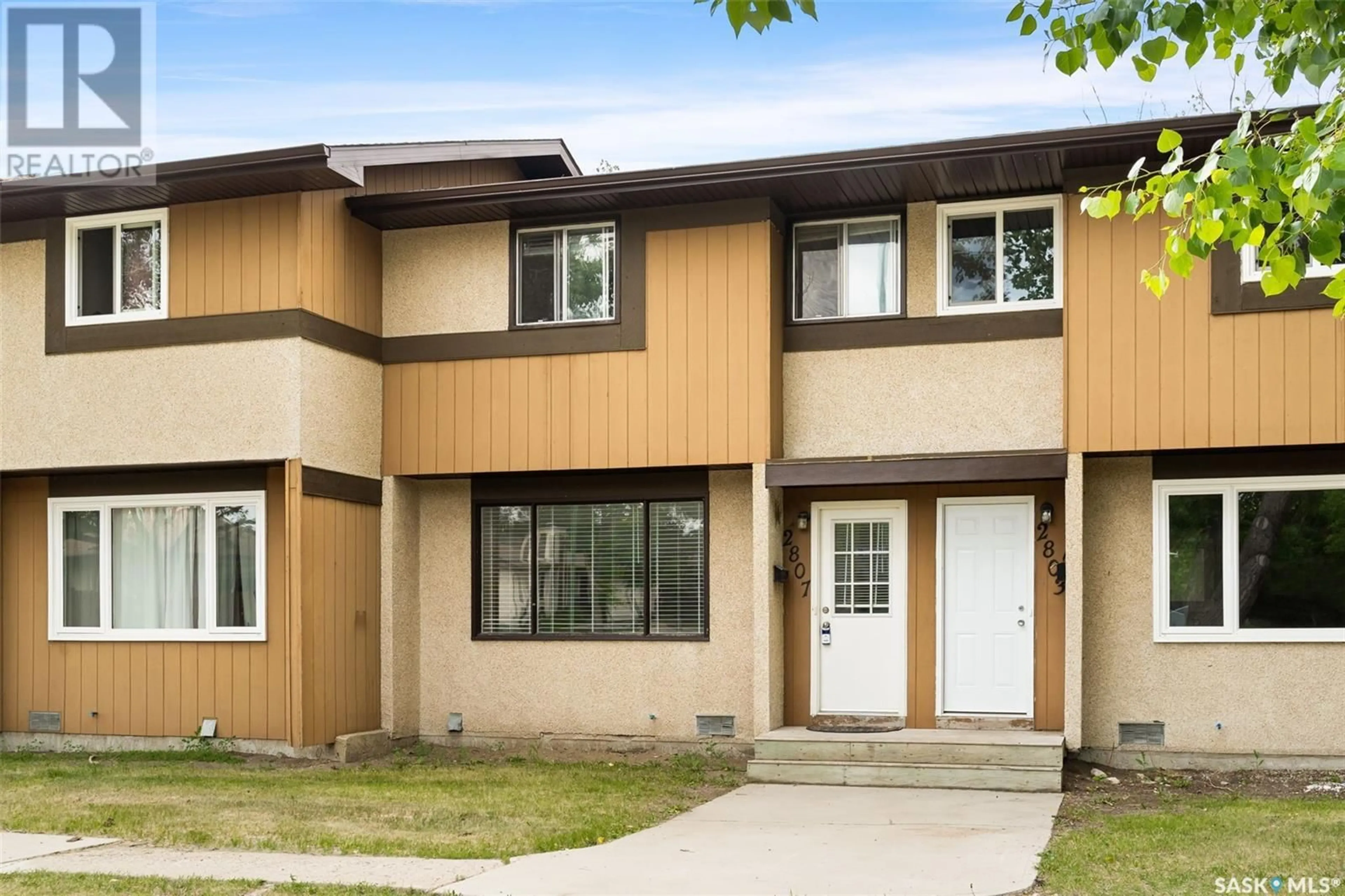 Home with vinyl exterior material, street for 2807 7TH AVENUE, Regina Saskatchewan S4N5N2