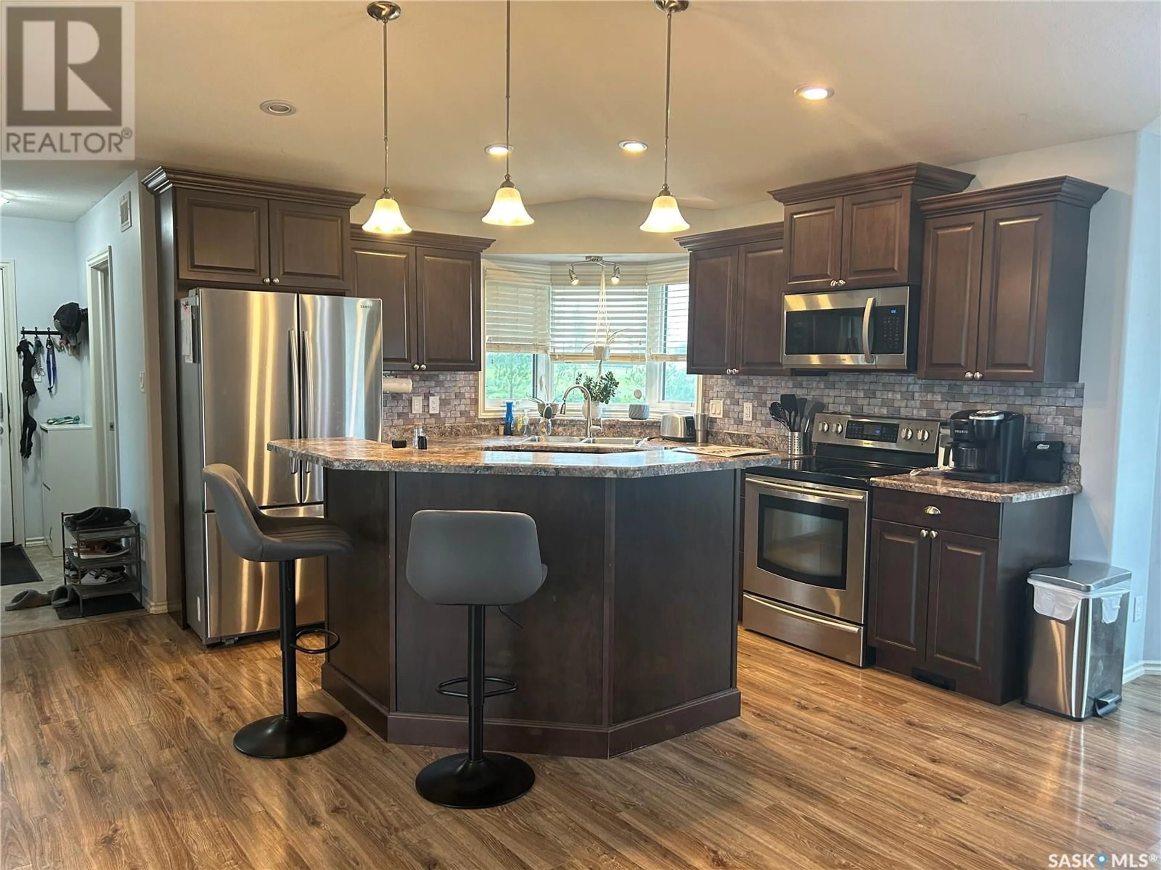 Open concept kitchen, unknown for LEWIN ACREAGE, Estevan Rm No. 5 Saskatchewan S4A2A7