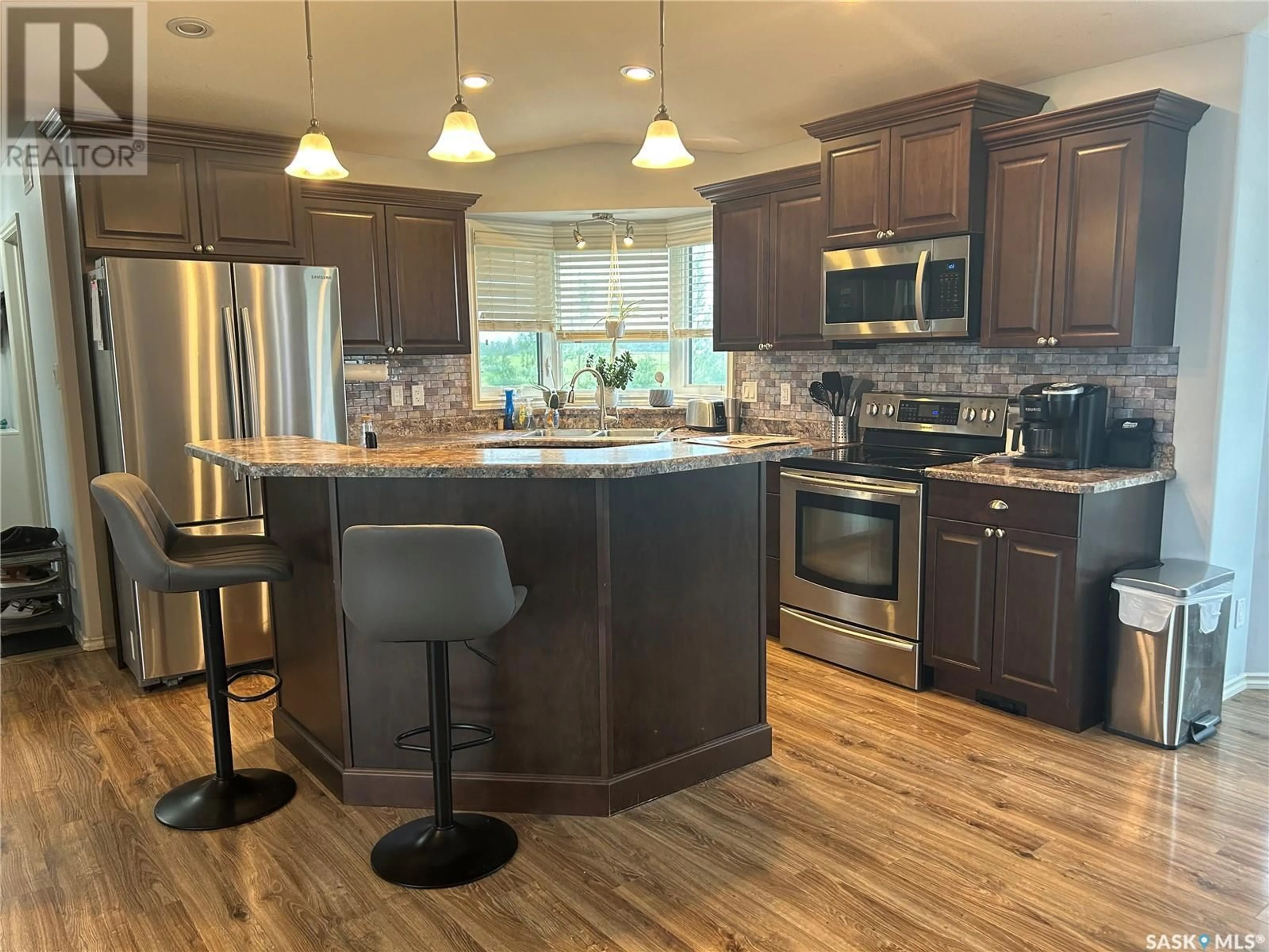 Open concept kitchen, unknown for LEWIN ACREAGE, Estevan Rm No. 5 Saskatchewan S4A2A7