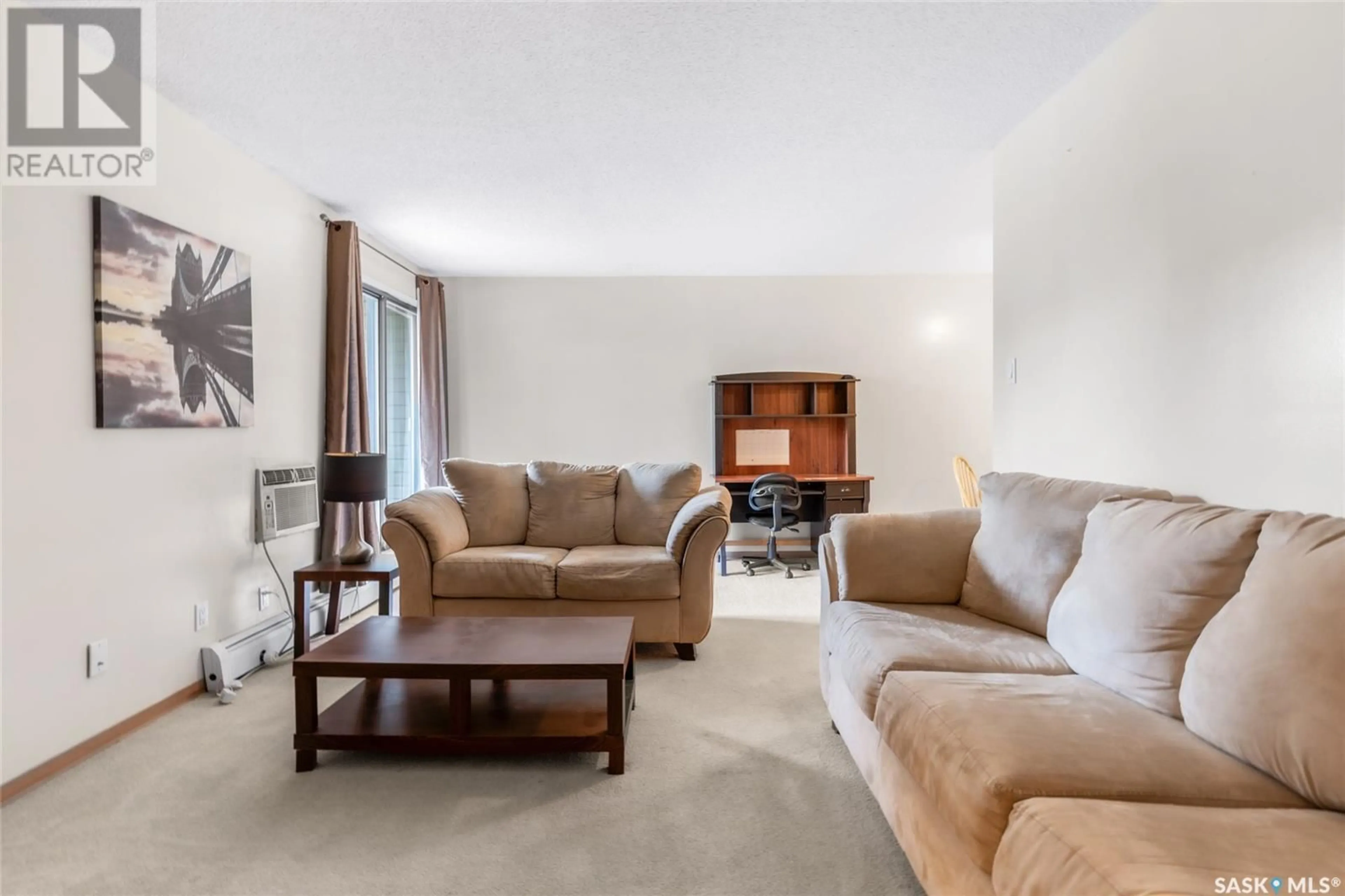 Living room with furniture, carpet floor for 4230 - 214 DEGEER STREET, Saskatoon Saskatchewan S7H6G9