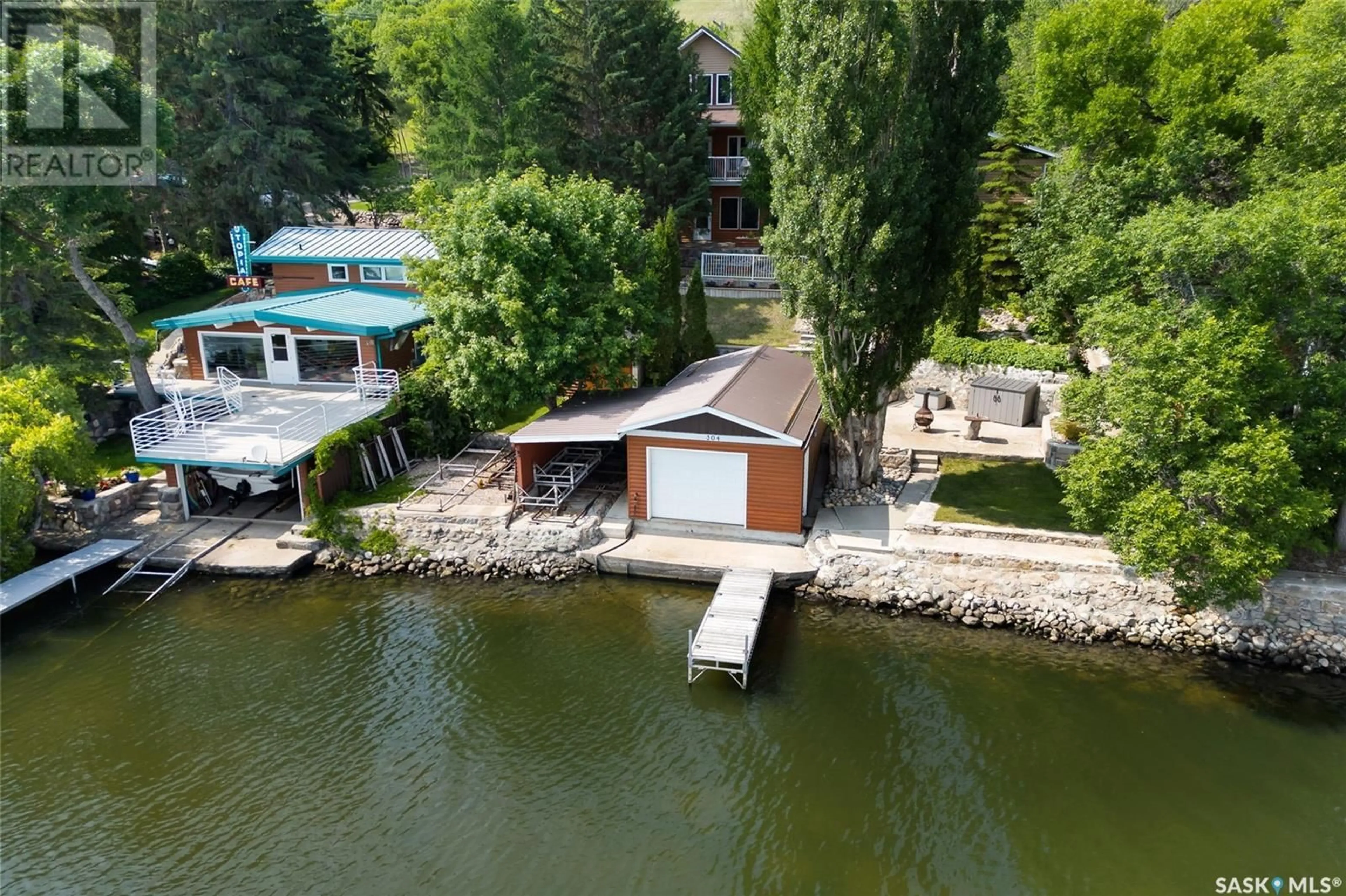 A pic from outside/outdoor area/front of a property/back of a property/a pic from drone, water/lake/river/ocean view for 304 PASQUA LAKE ROAD, North Qu'Appelle Rm No. 187 Saskatchewan S0G1S0