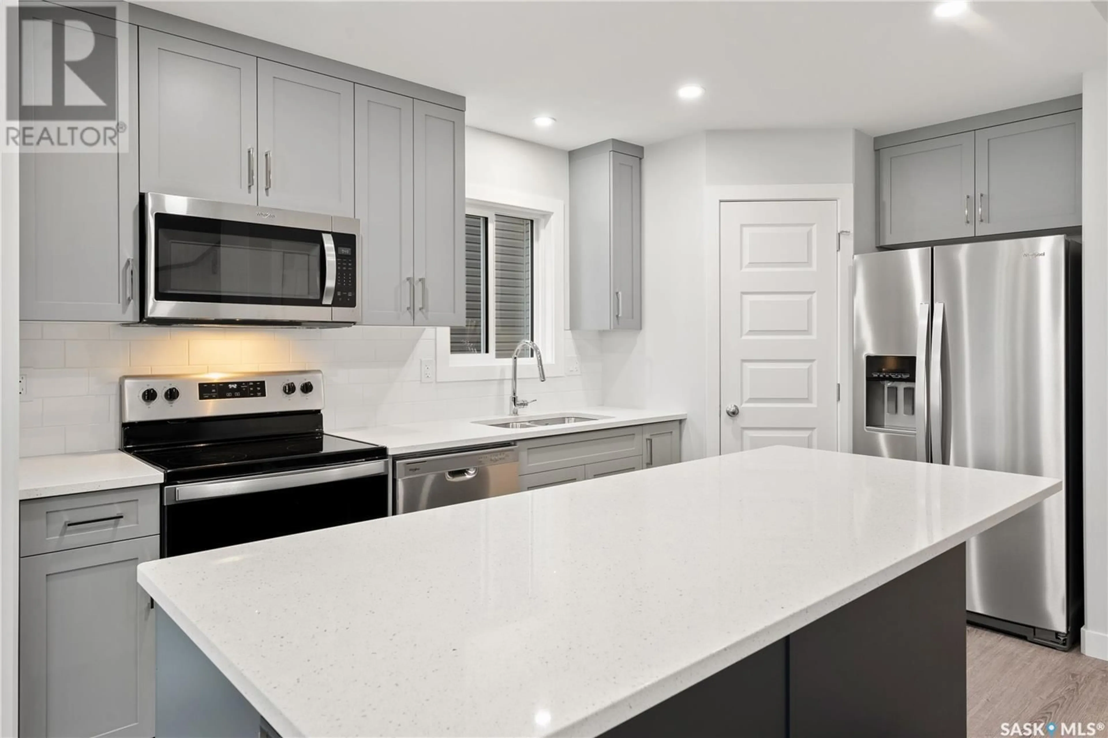 Open concept kitchen, ceramic/tile floor for 194 KOSTIUK CRESCENT, Saskatoon Saskatchewan S7W0L8