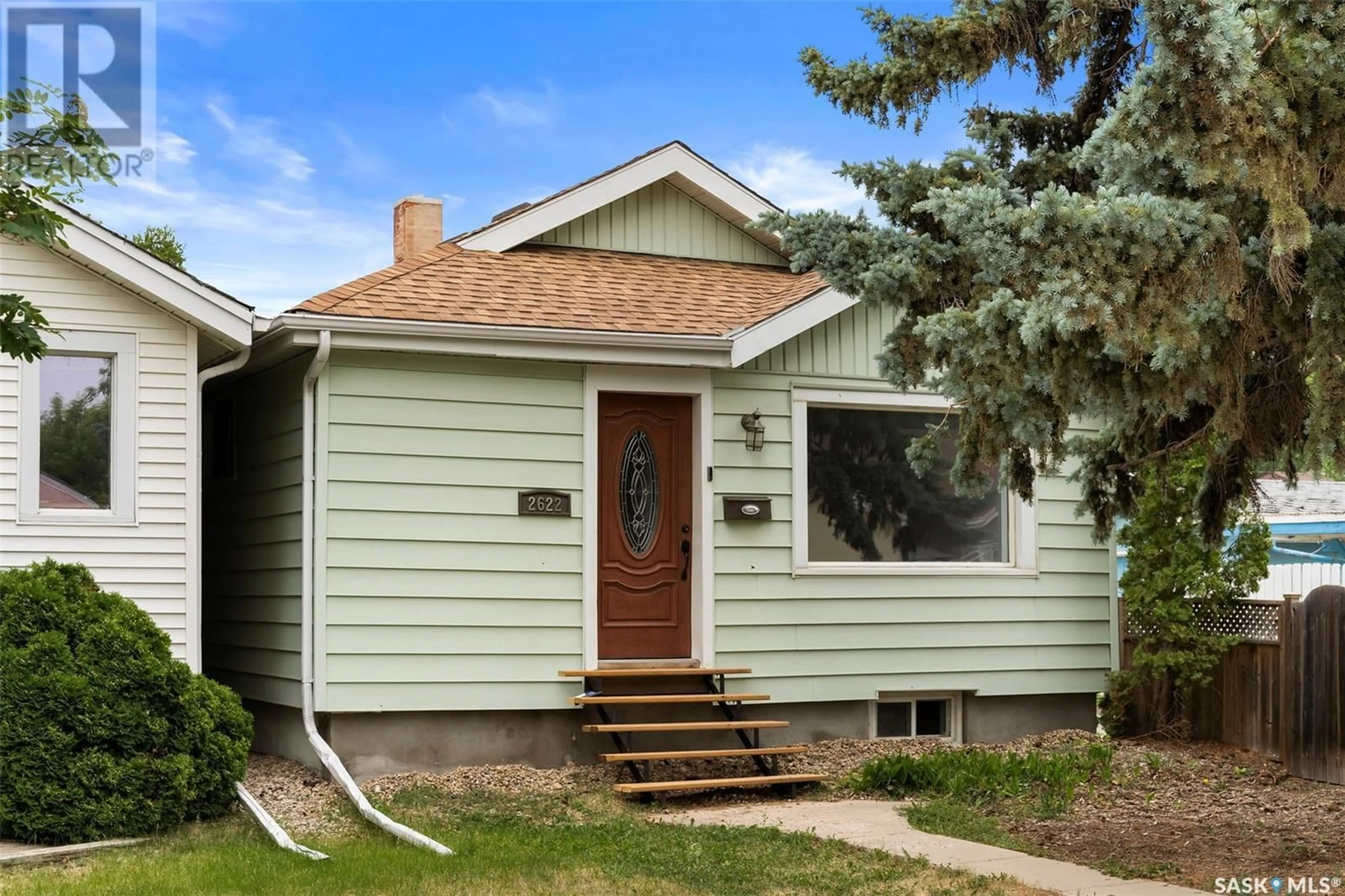 Home with vinyl exterior material, street for 2622 ATKINSON STREET, Regina Saskatchewan S4N3X9