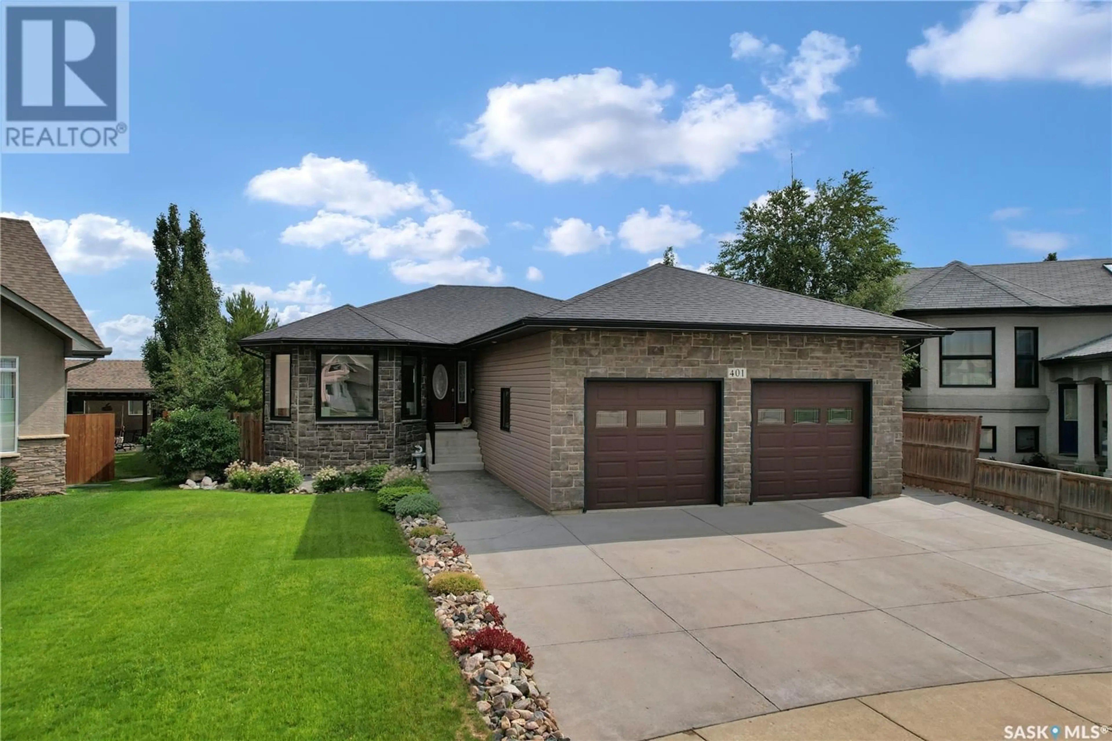 Home with brick exterior material, street for 401 BENDEL CRESCENT, Martensville Saskatchewan S0K2T2