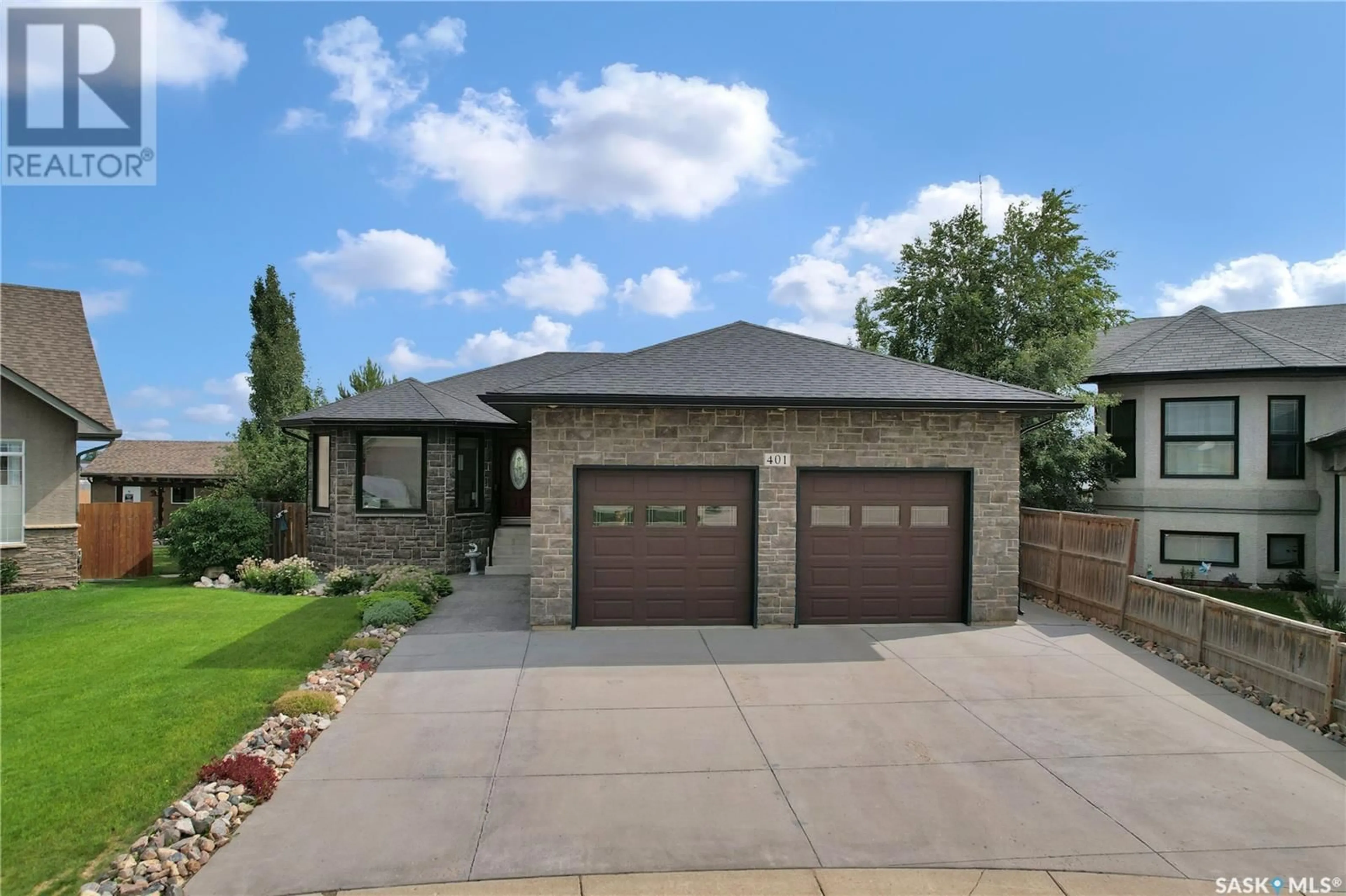 Home with brick exterior material, street for 401 BENDEL CRESCENT, Martensville Saskatchewan S0K2T2