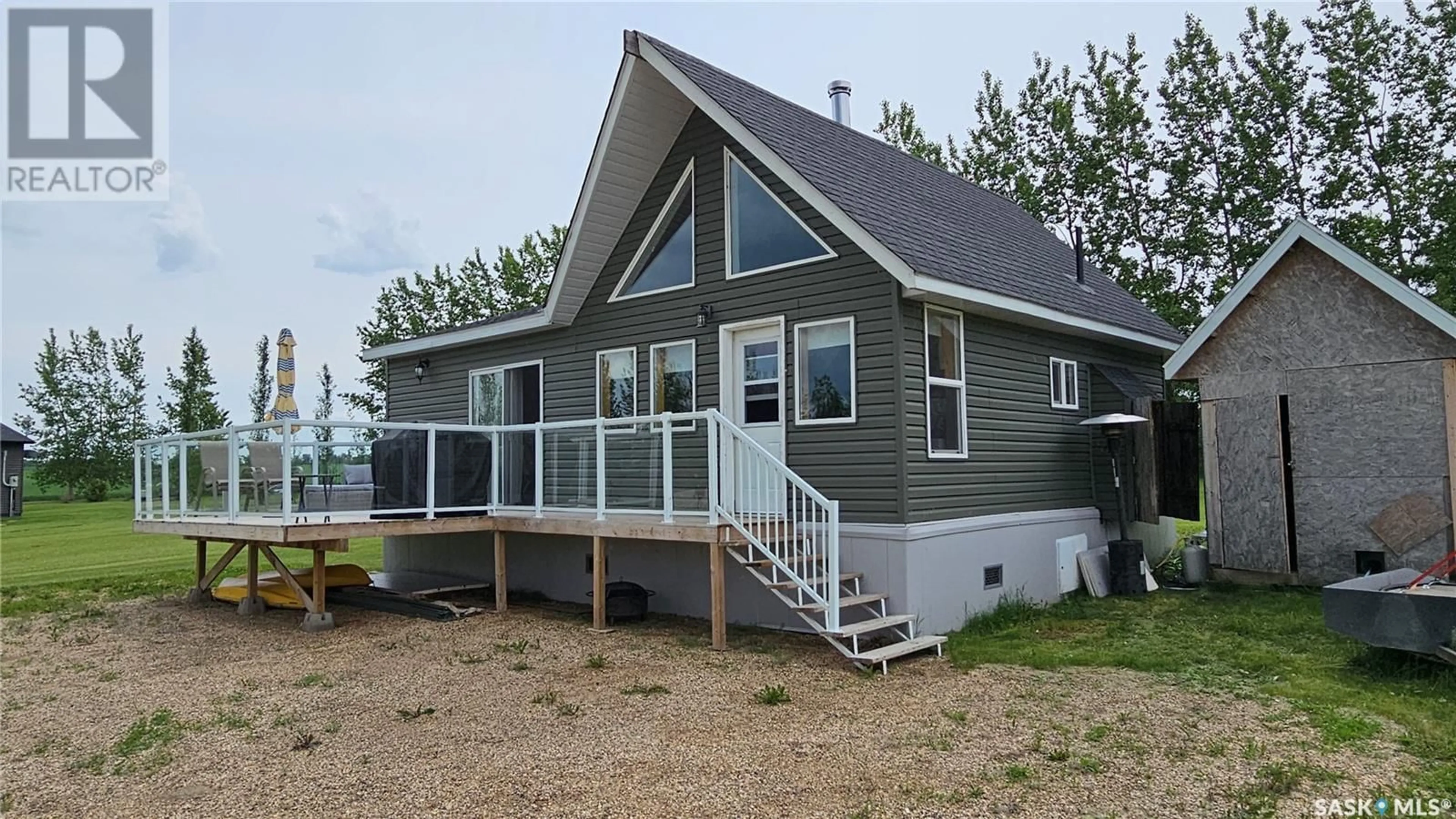 Home with vinyl exterior material, water/lake/river/ocean view for 106 LAKESHORE DRIVE, Three Lakes Rm No. 400 Saskatchewan S0K2J0
