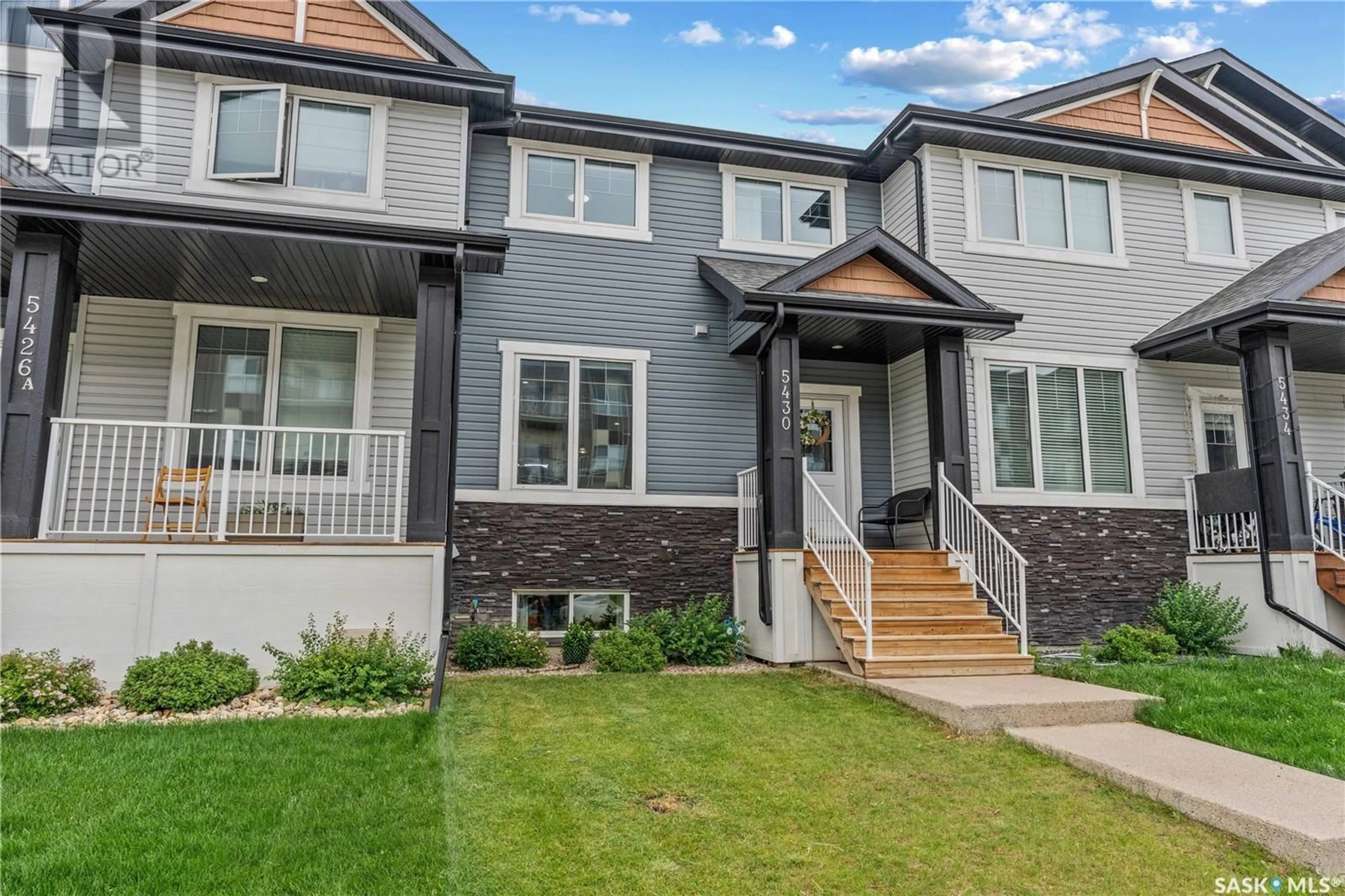 Home with vinyl exterior material, street for 5430 PRIMROSE GREEN DRIVE, Regina Saskatchewan S4V3S8