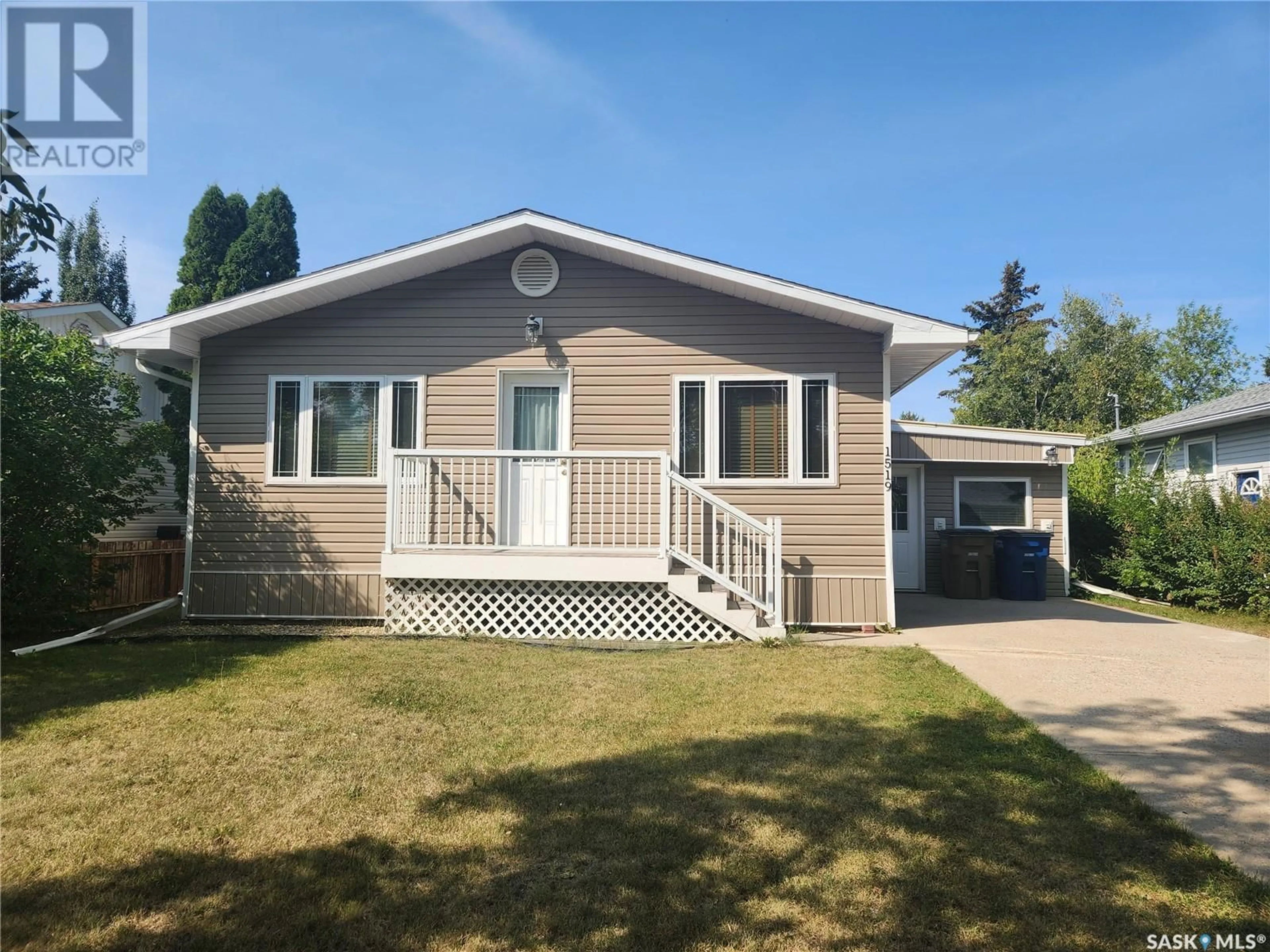 Home with vinyl exterior material, street for 1519 97TH STREET, Tisdale Saskatchewan S0E1T0