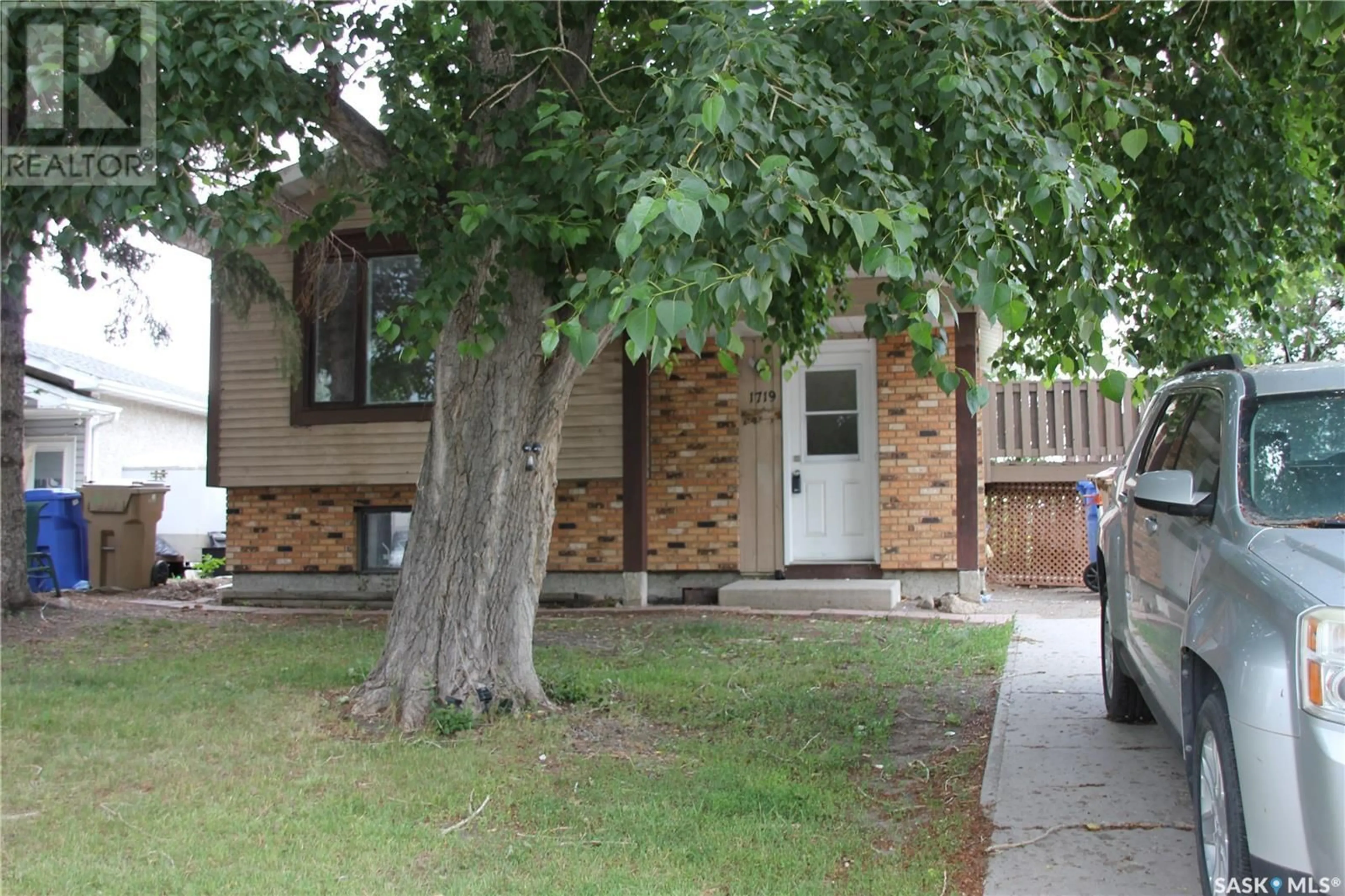 Home with brick exterior material, street for 1719 FLEET STREET, Regina Saskatchewan S4N6B4