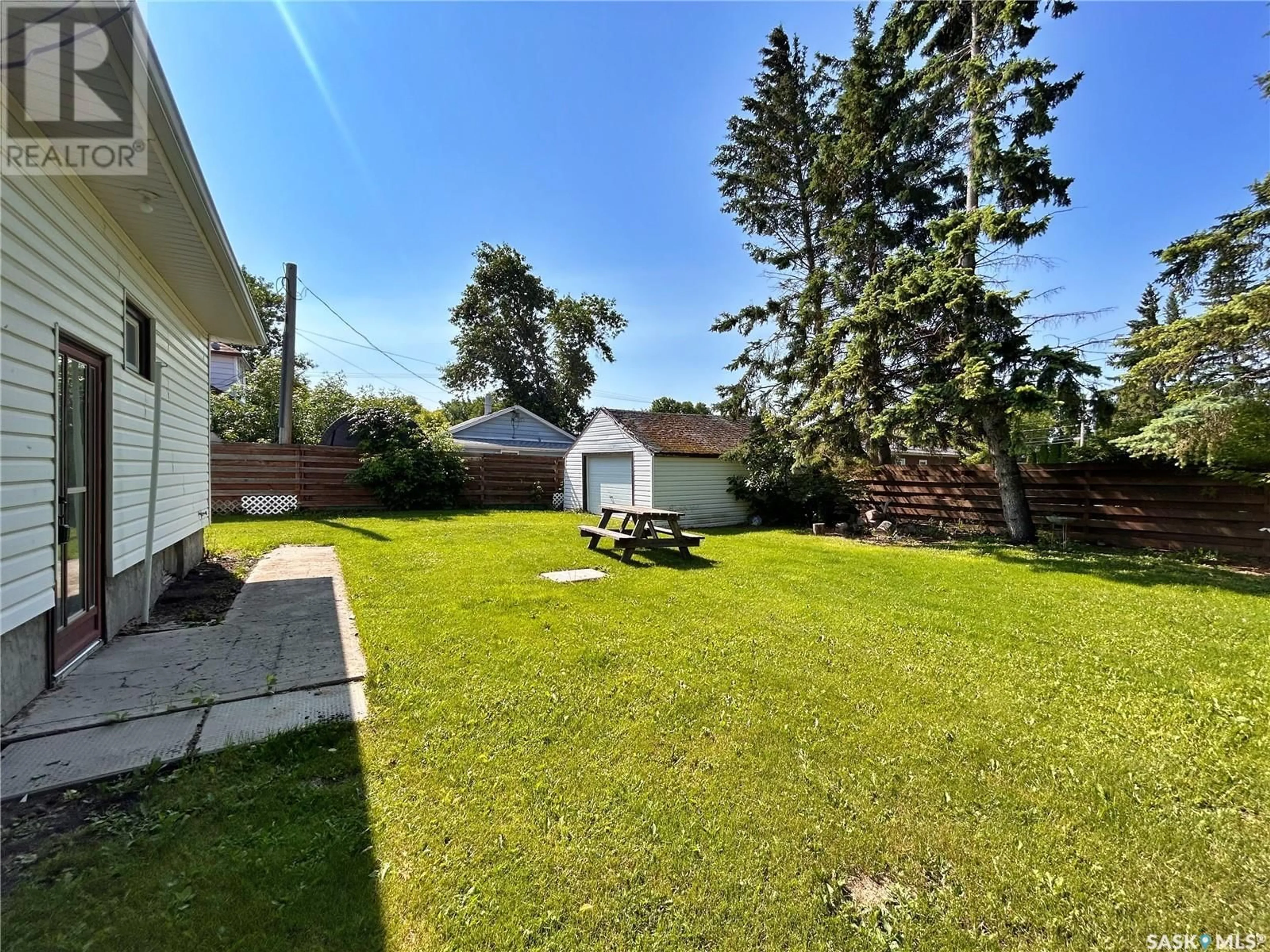 A pic from outside/outdoor area/front of a property/back of a property/a pic from drone, street for 1205 BROADWAY AVENUE, Moosomin Saskatchewan S0G3N0