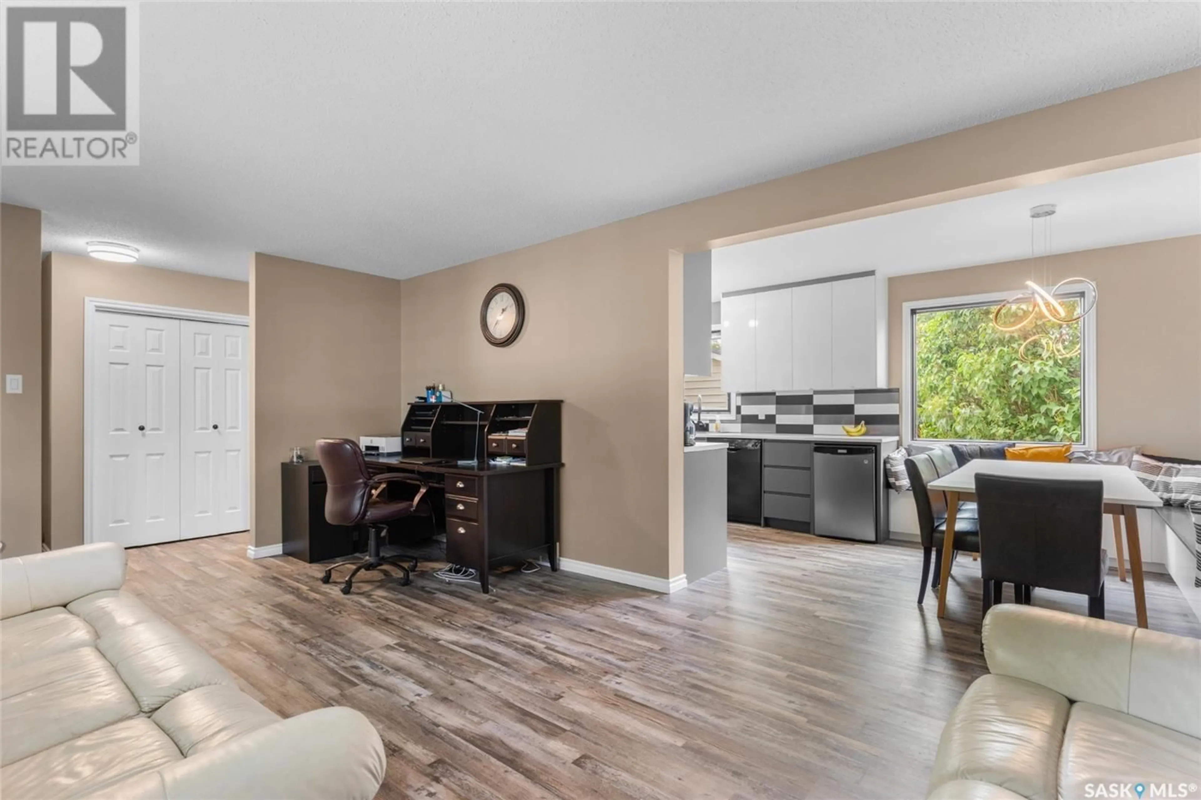 Open concept kitchen, wood/laminate floor for 538 TRENT CRESCENT, Saskatoon Saskatchewan S7H4T1