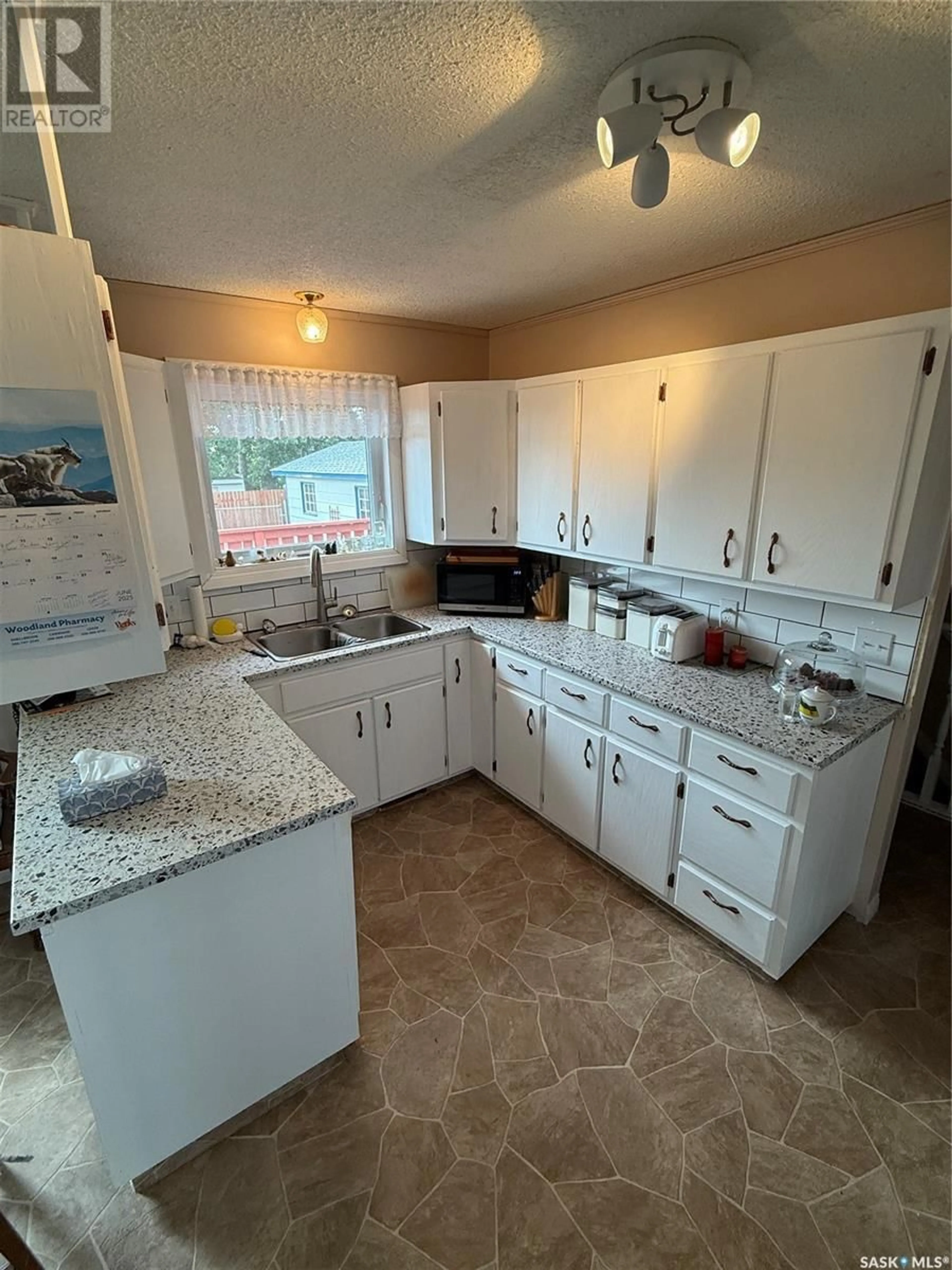 Standard kitchen, ceramic/tile floor for 707 CHAMBERS COURT, Shellbrook Saskatchewan S0J2E0
