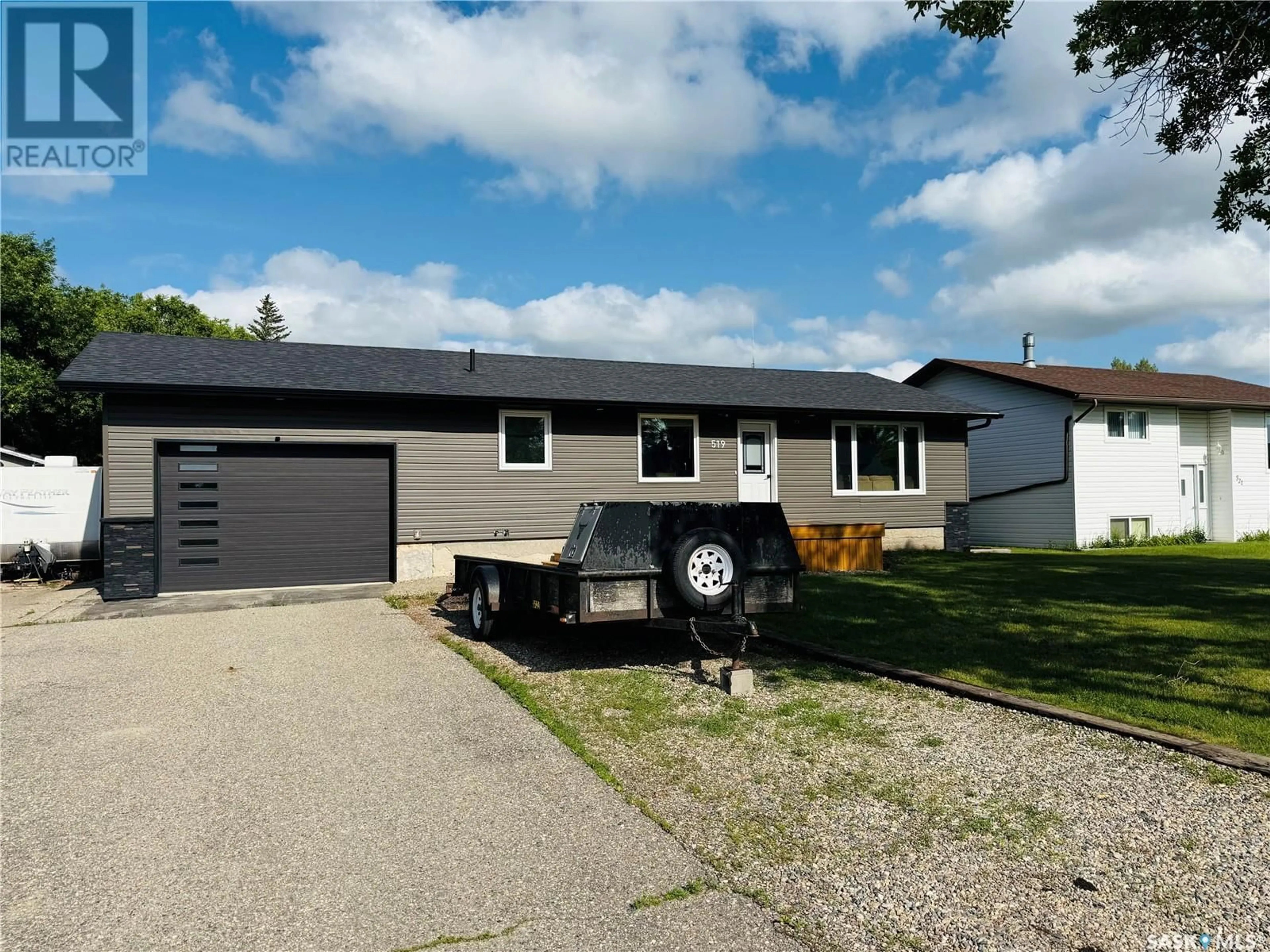 Home with vinyl exterior material, street for 519 COOK ROAD, Moosomin Saskatchewan S0G3N0