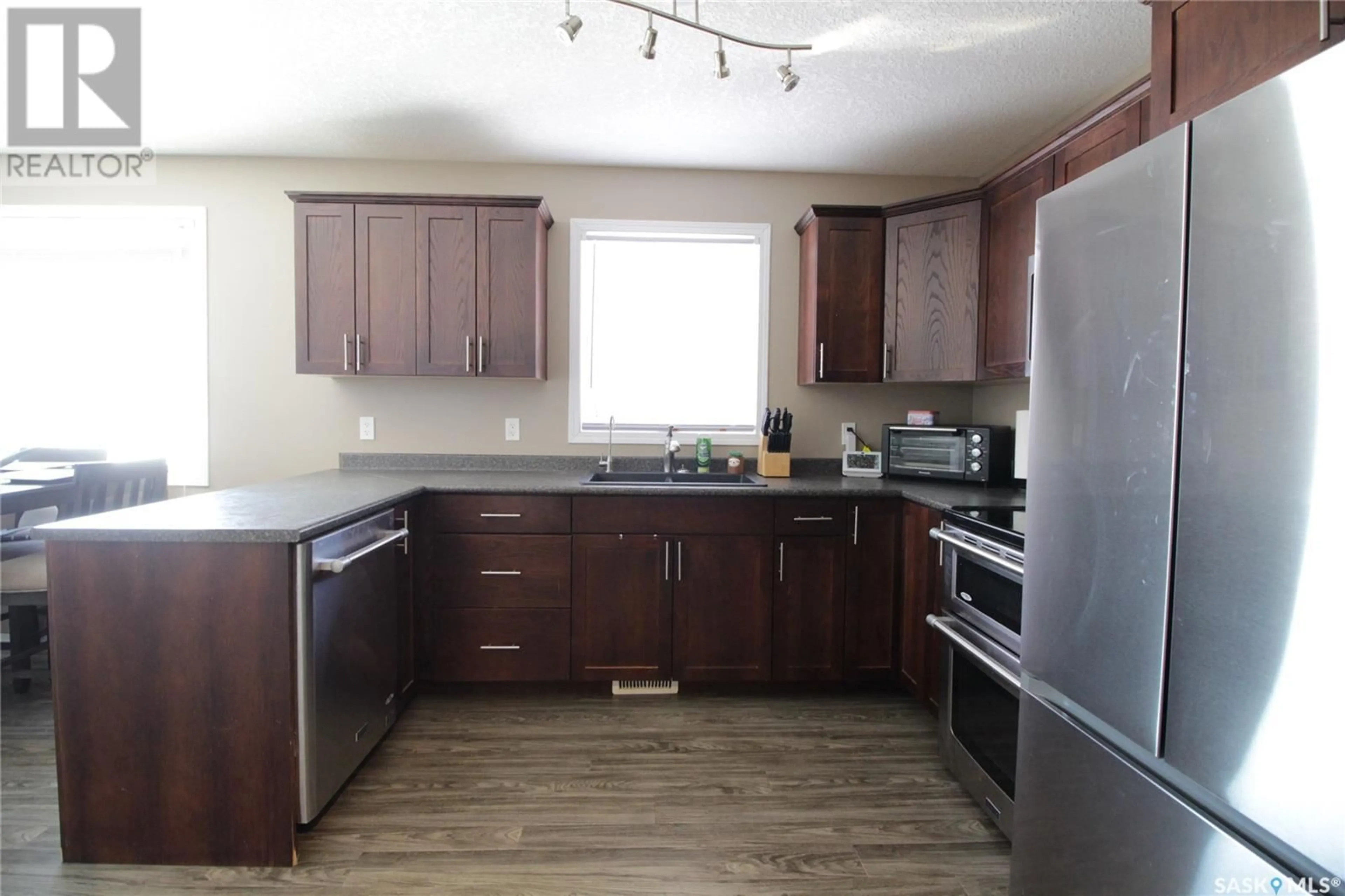 Standard kitchen, wood/laminate floor for 519 COOK ROAD, Moosomin Saskatchewan S0G3N0