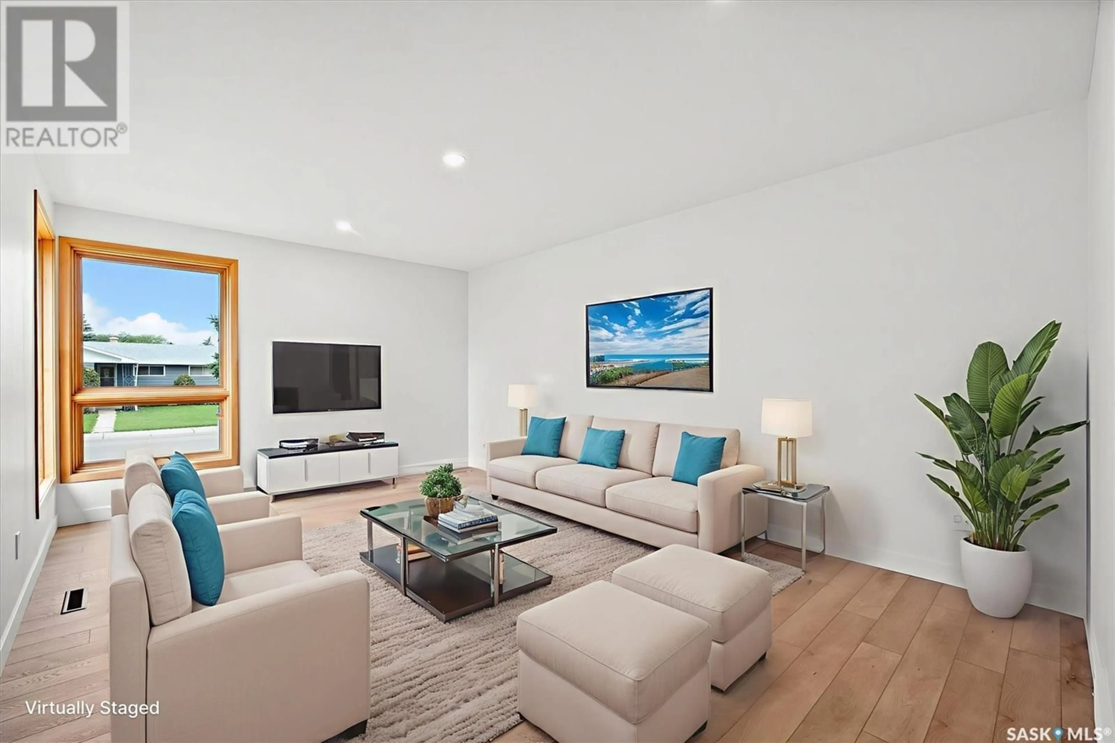 Living room with furniture, wood/laminate floor for 62 BRITNELL CRESCENT, Saskatoon Saskatchewan S7H3X8