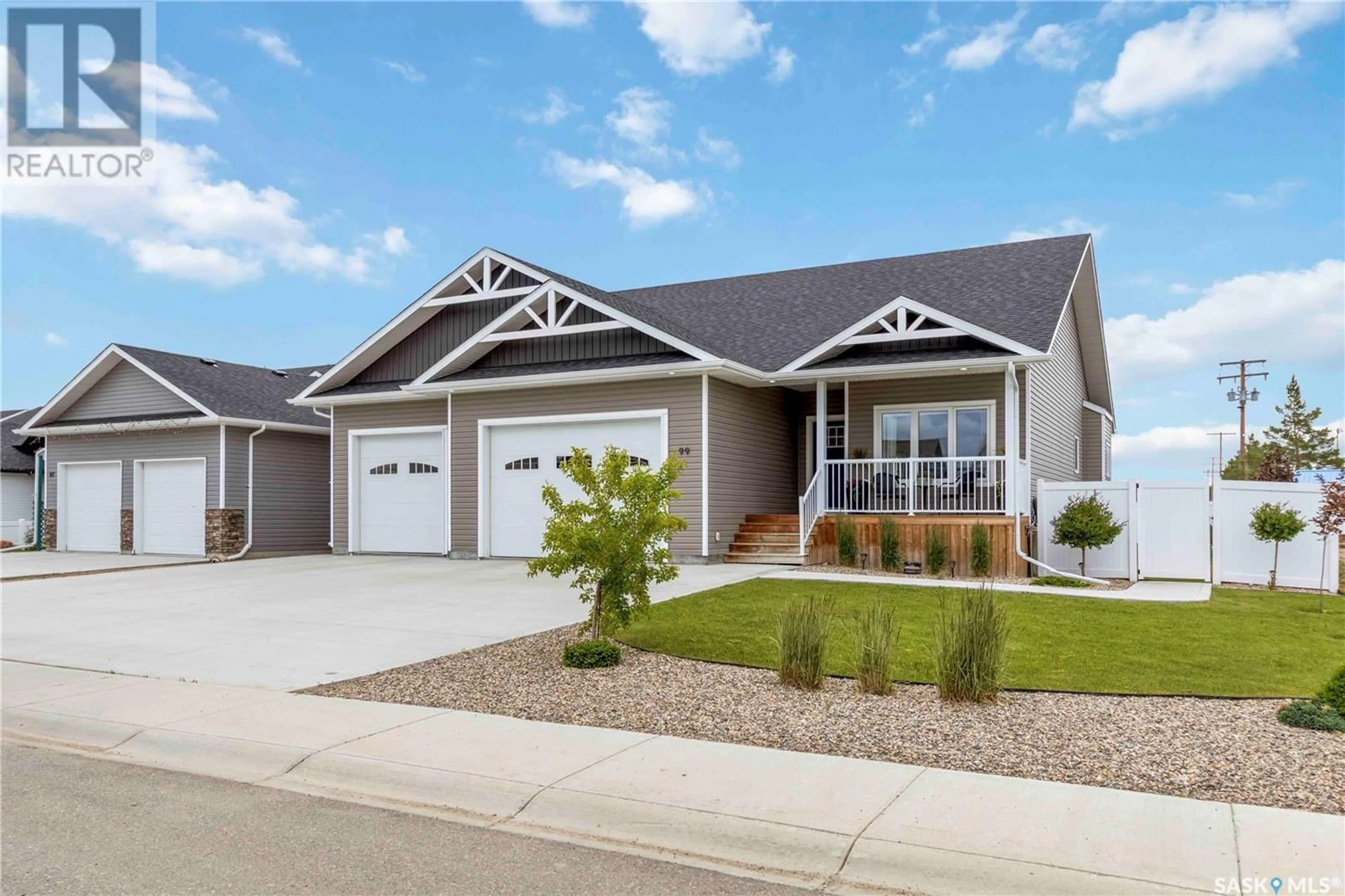 Home with vinyl exterior material, street for 99 DIEFENBAKER AVENUE, Hague Saskatchewan S0K1X0
