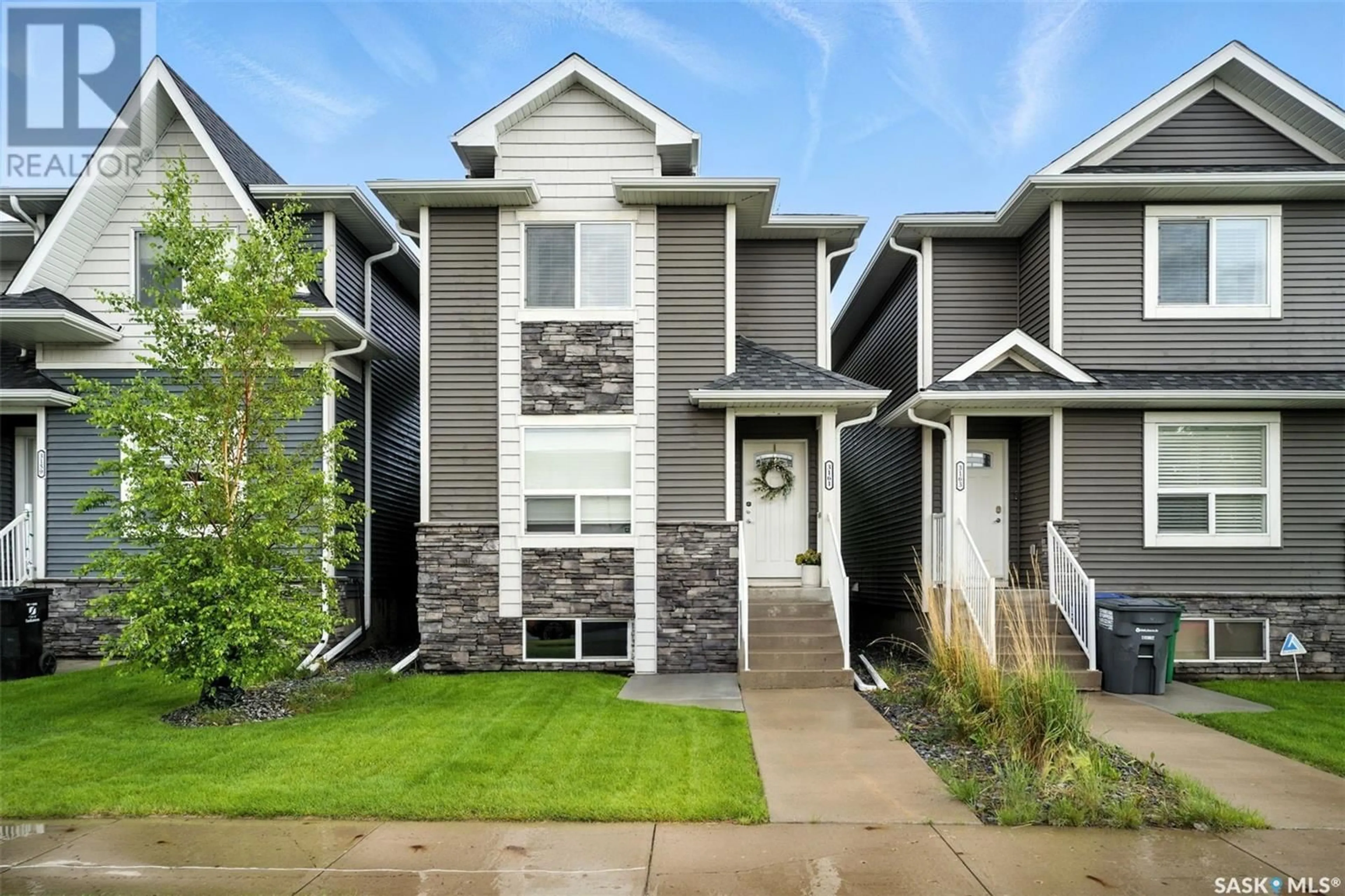 Home with vinyl exterior material, street for 3161 MCCLOCKLIN ROAD, Saskatoon Saskatchewan S7R0J1