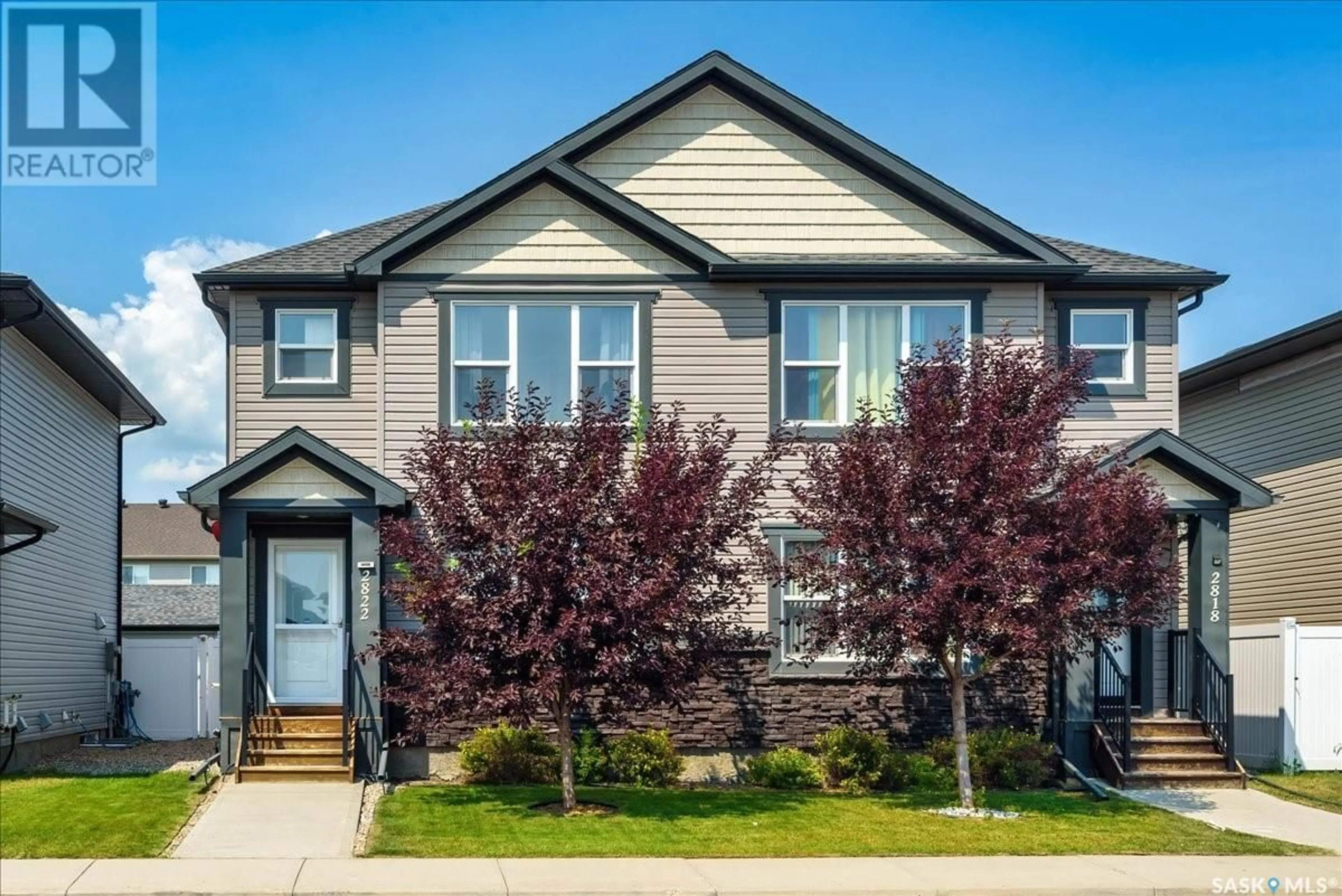 Home with vinyl exterior material, street for 2822 ROCHDALE BOULEVARD, Regina Saskatchewan S4X0M6