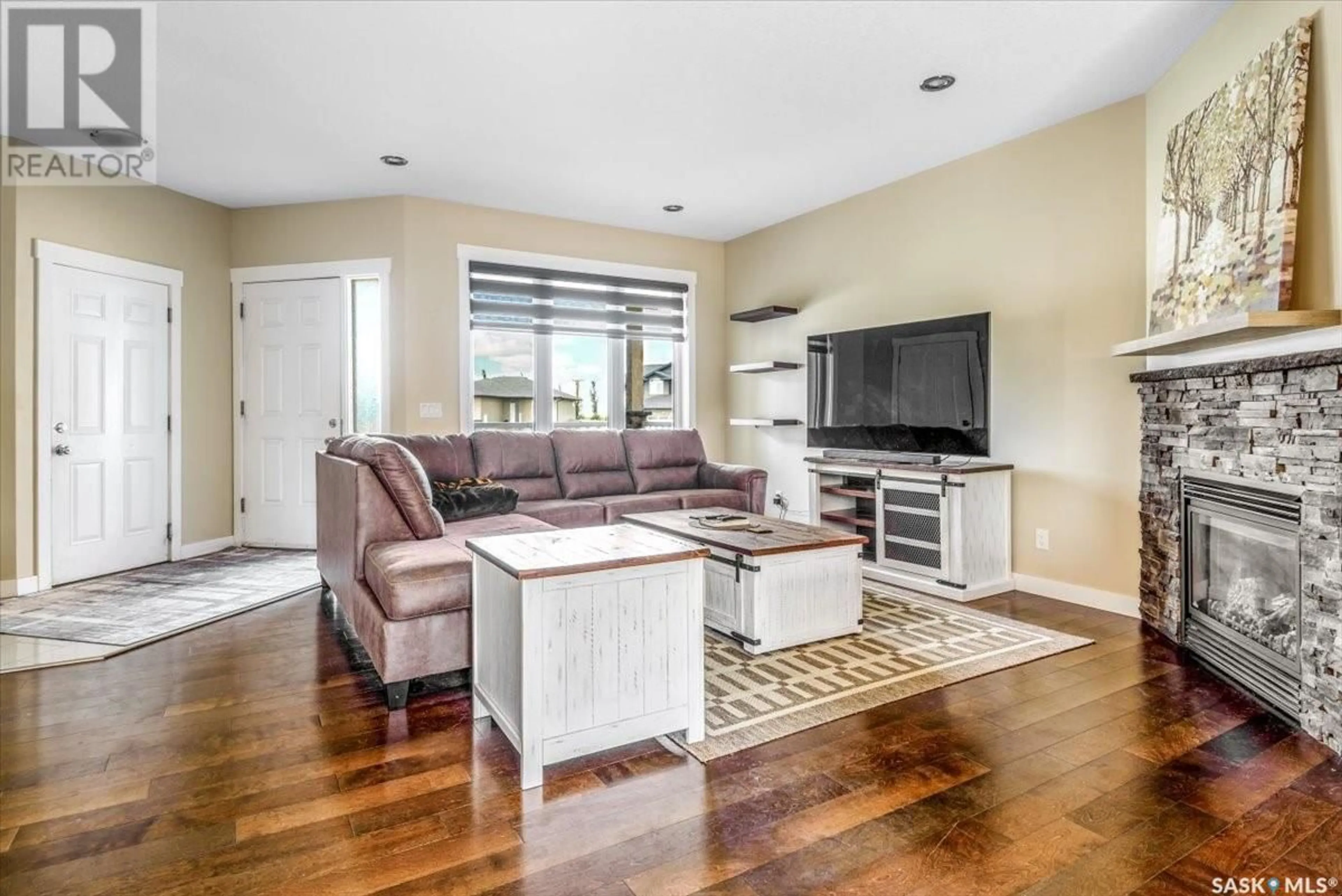 Living room with furniture, unknown for 21 DAWN BAY, White City Saskatchewan S4L0A1