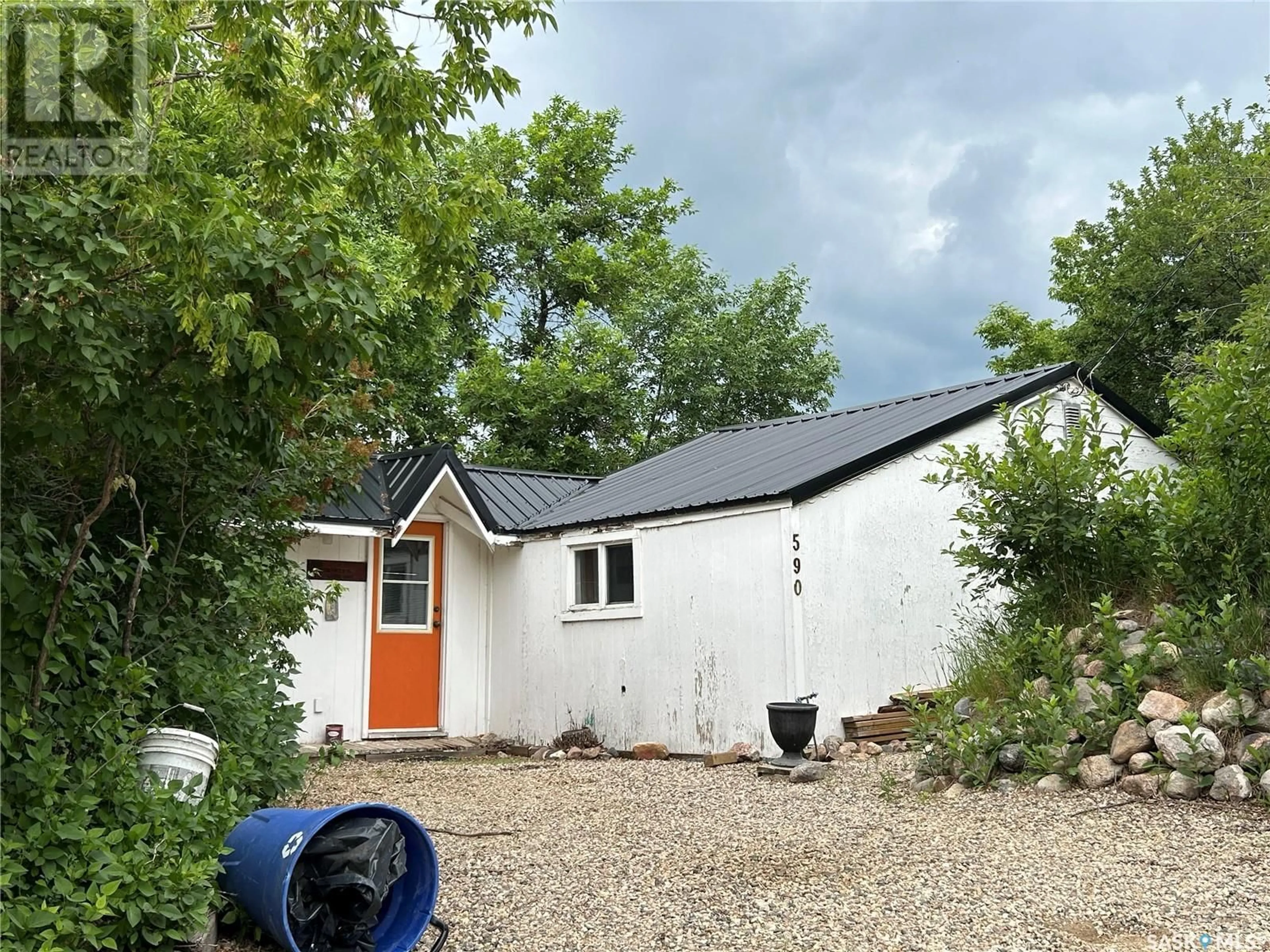 A pic from outside/outdoor area/front of a property/back of a property/a pic from drone, unknown for 590 MACMURCHY AVENUE, Regina Beach Saskatchewan S0G4C0