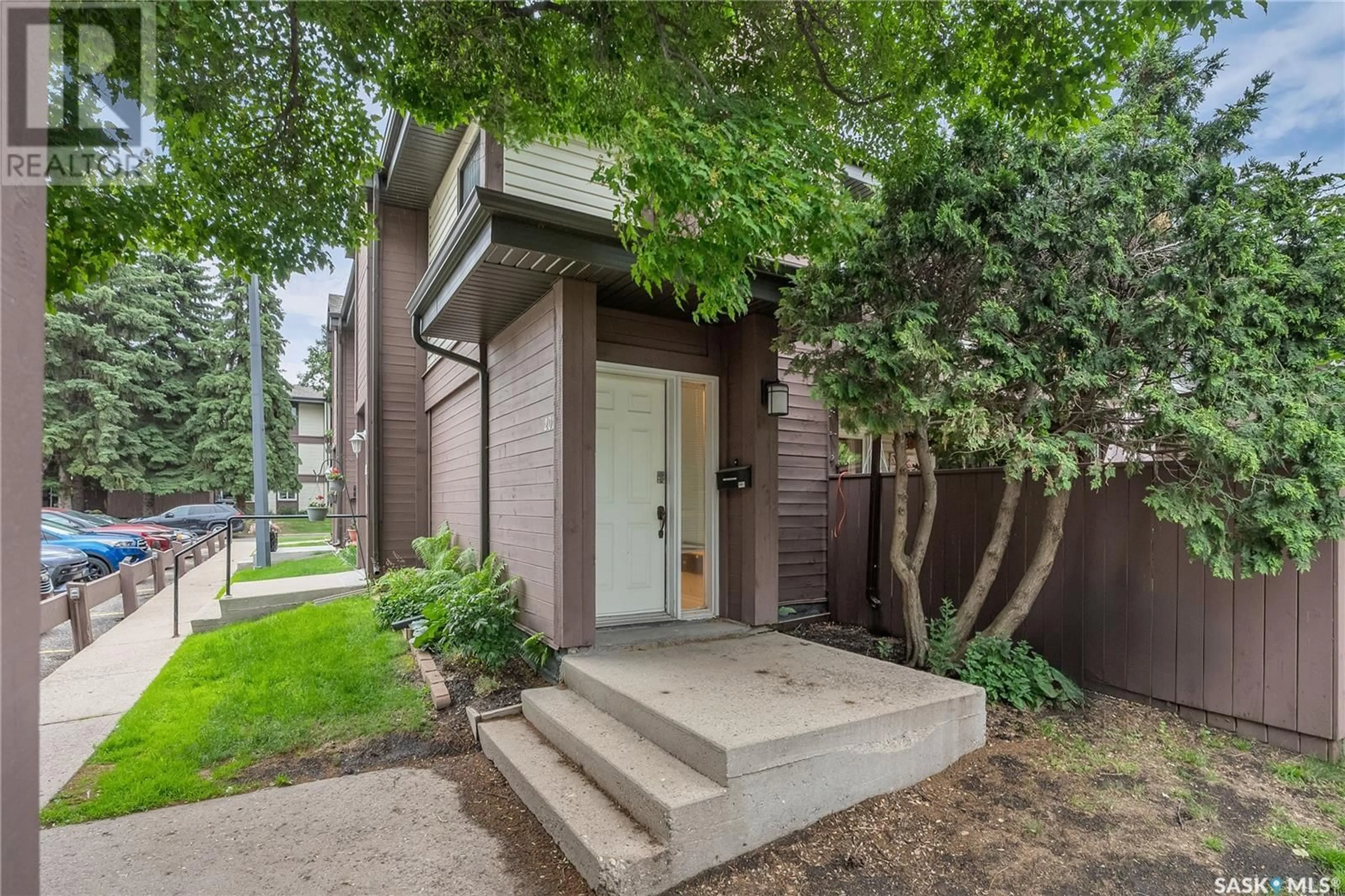 Home with brick exterior material, street for 202 441 PENDYGRASSE ROAD, Saskatoon Saskatchewan S7M5C1