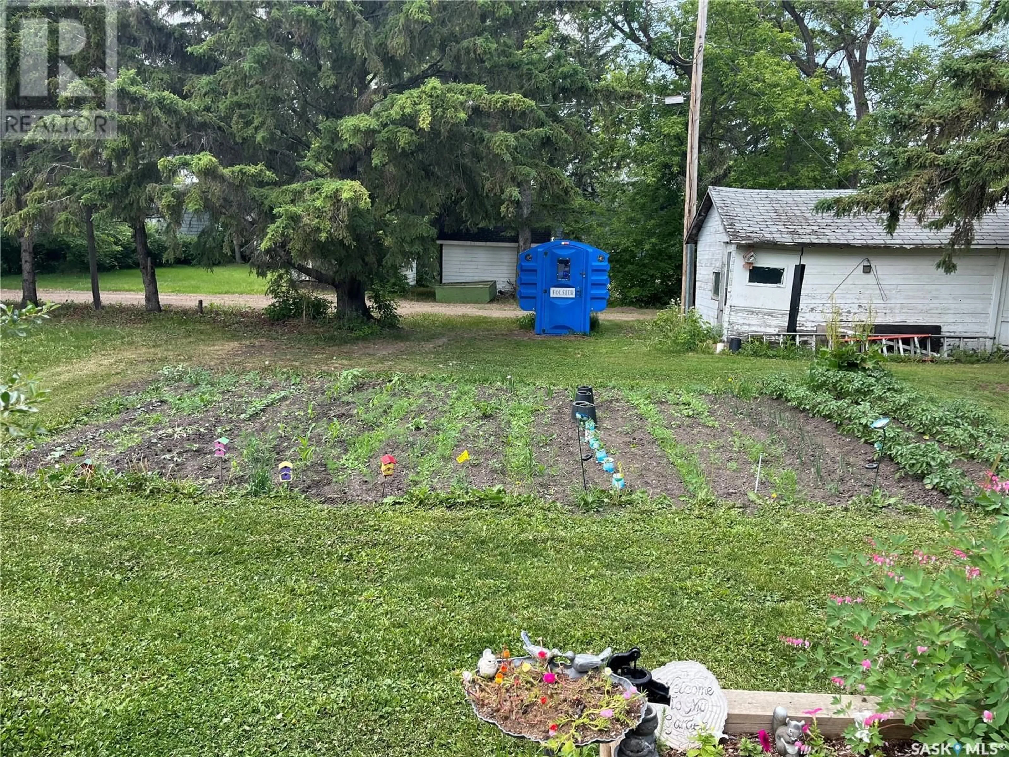A pic from outside/outdoor area/front of a property/back of a property/a pic from drone, street for 237 2ND STREET, Wadena Saskatchewan S0A4J0