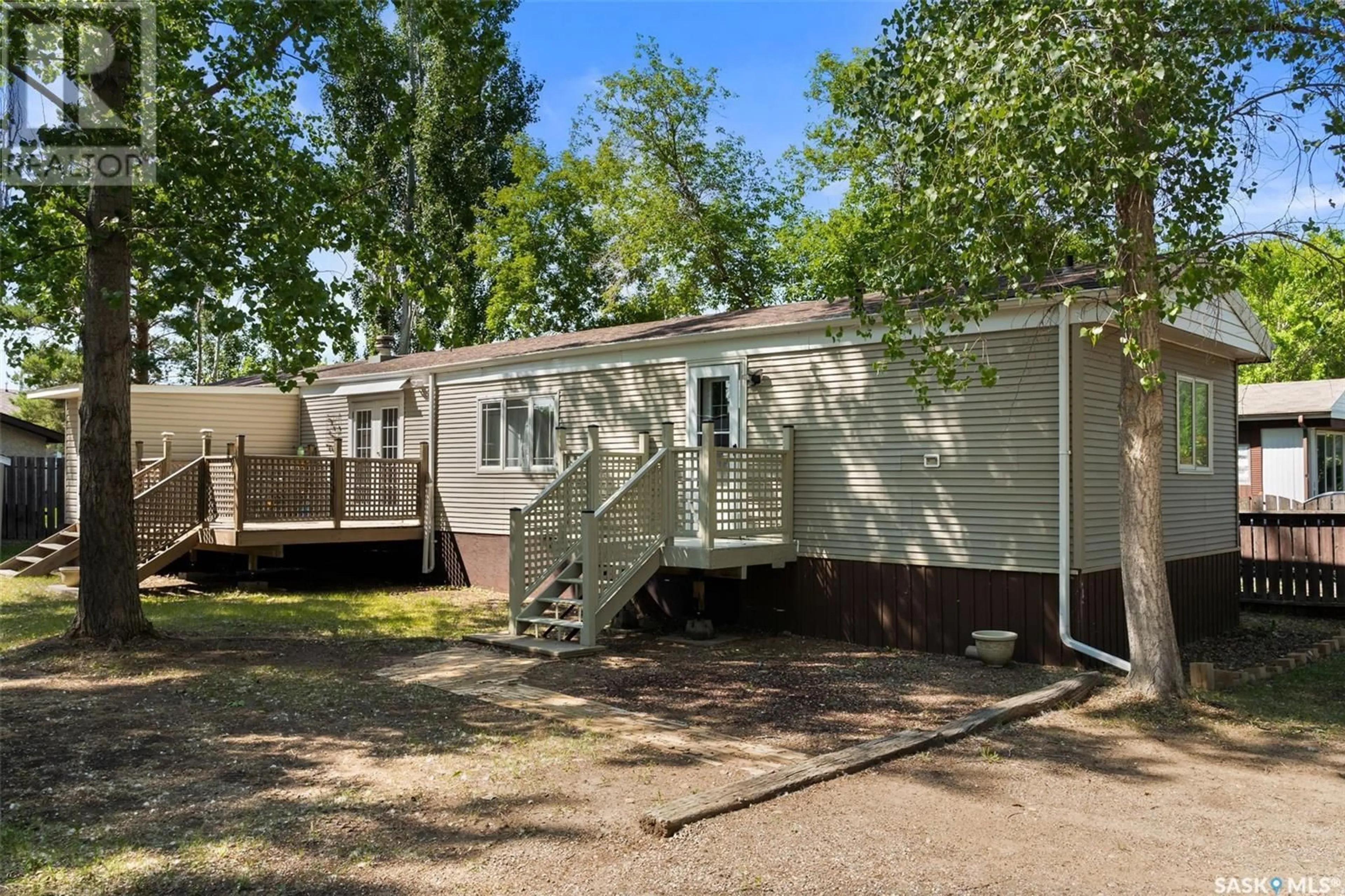 A pic from outside/outdoor area/front of a property/back of a property/a pic from drone, street for 104 DONOVEL CRESCENT, Regina Beach Saskatchewan S0G4C0