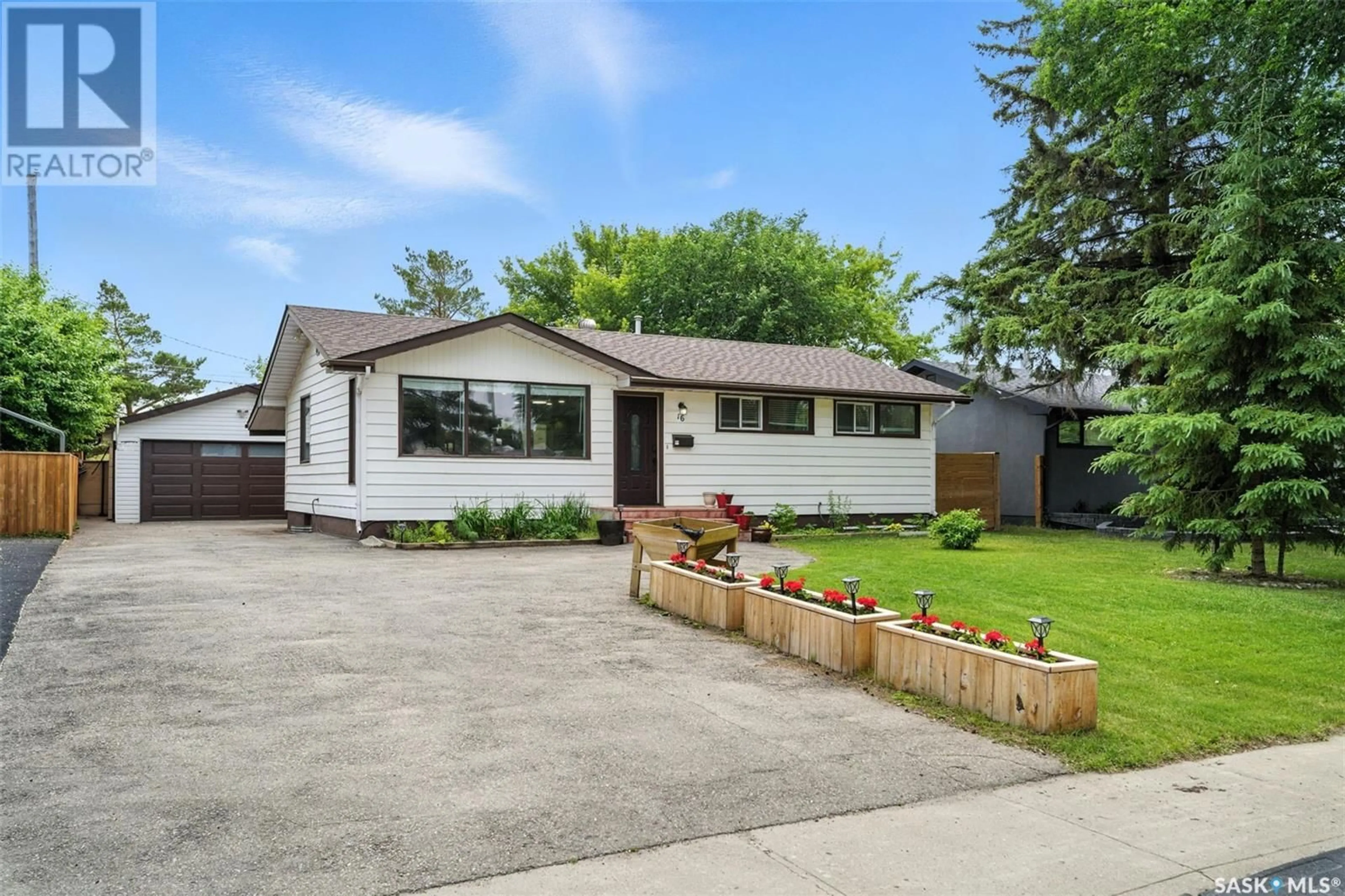 Home with vinyl exterior material, street for 16 LINDSAY DRIVE, Saskatoon Saskatchewan S7H3E1