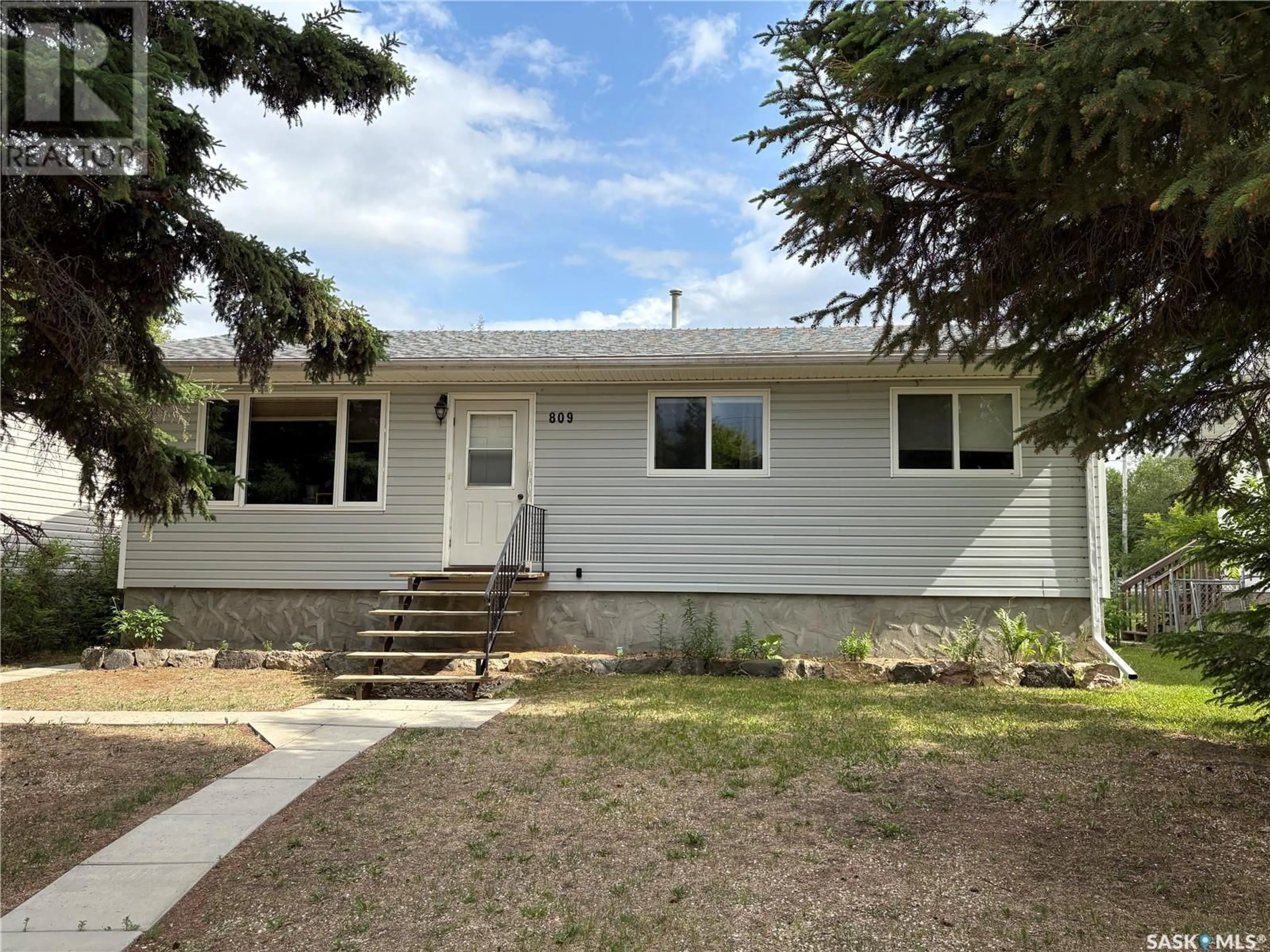 Home with vinyl exterior material, street for 809 MAIN STREET, Big River Saskatchewan S0J0E0