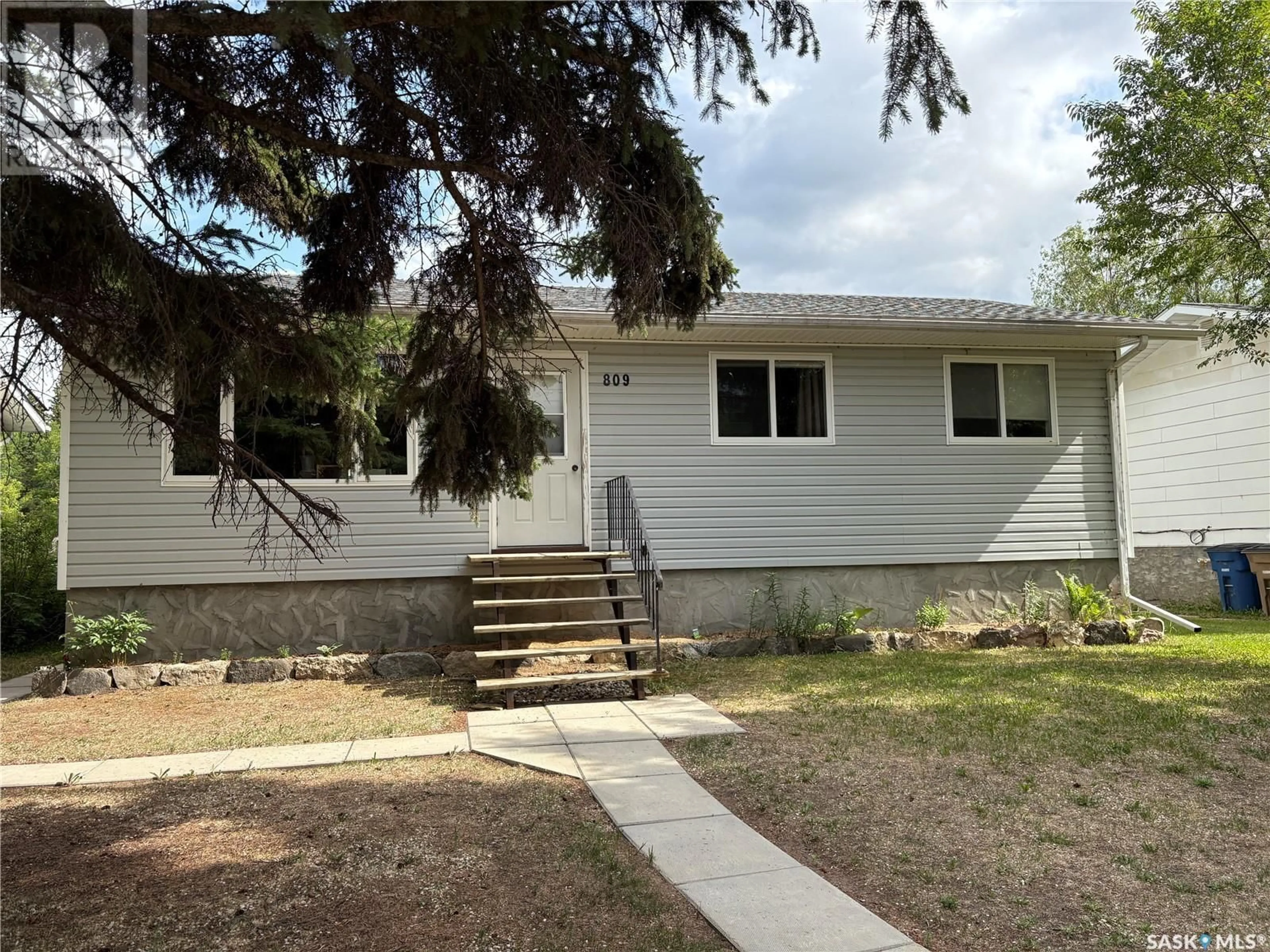 Home with vinyl exterior material, street for 809 MAIN STREET, Big River Saskatchewan S0J0E0