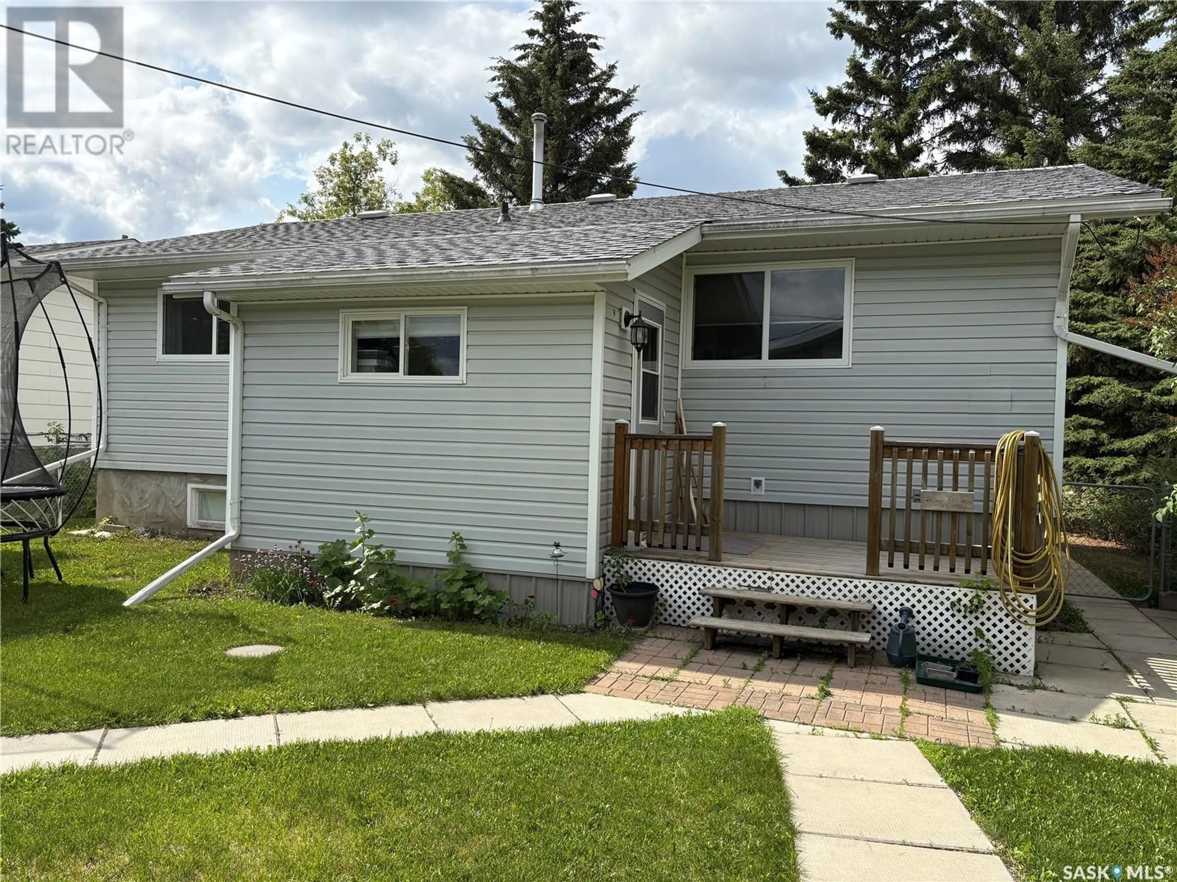 Home with vinyl exterior material, street for 809 MAIN STREET, Big River Saskatchewan S0J0E0