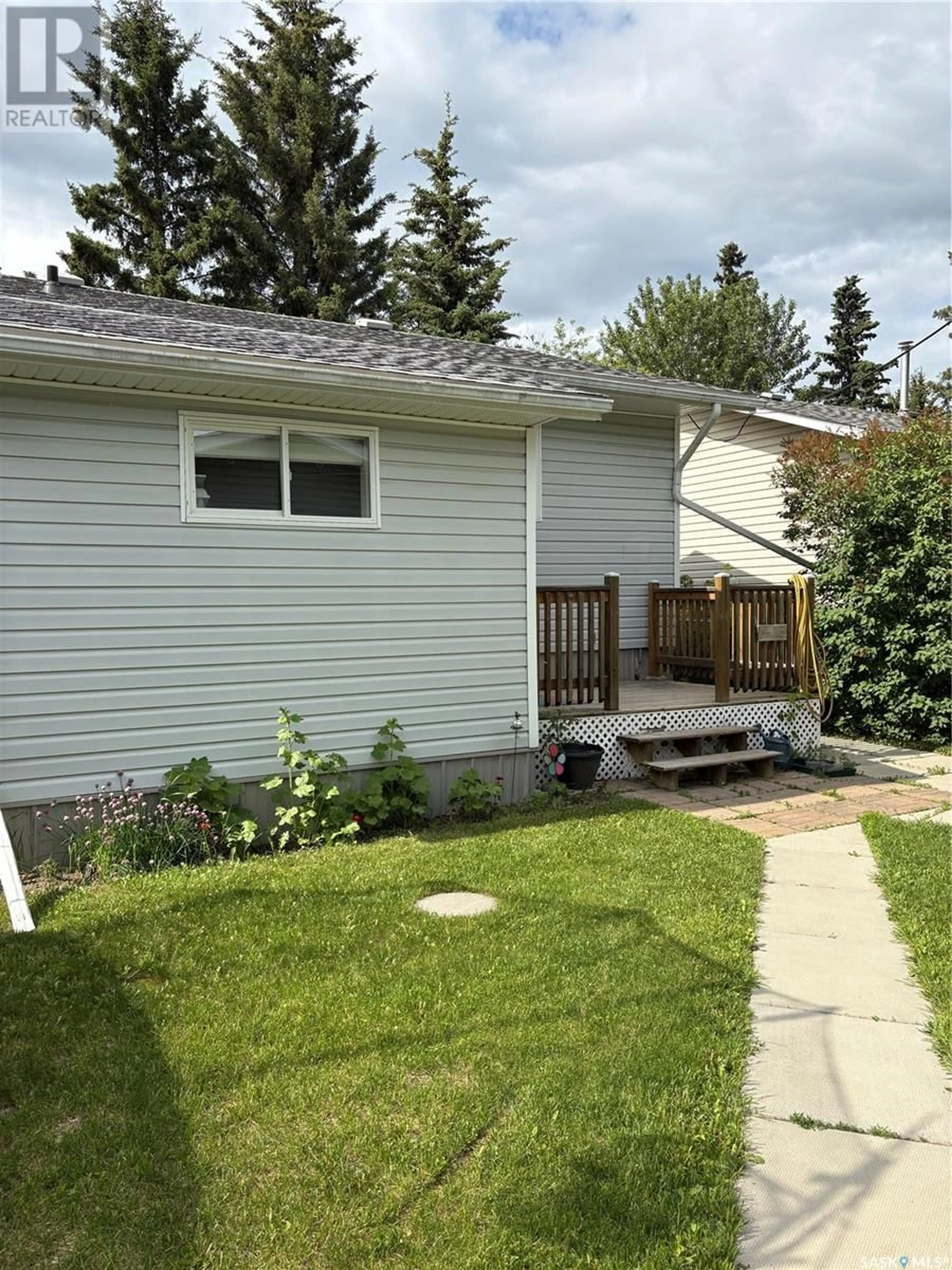 Home with vinyl exterior material, street for 809 MAIN STREET, Big River Saskatchewan S0J0E0