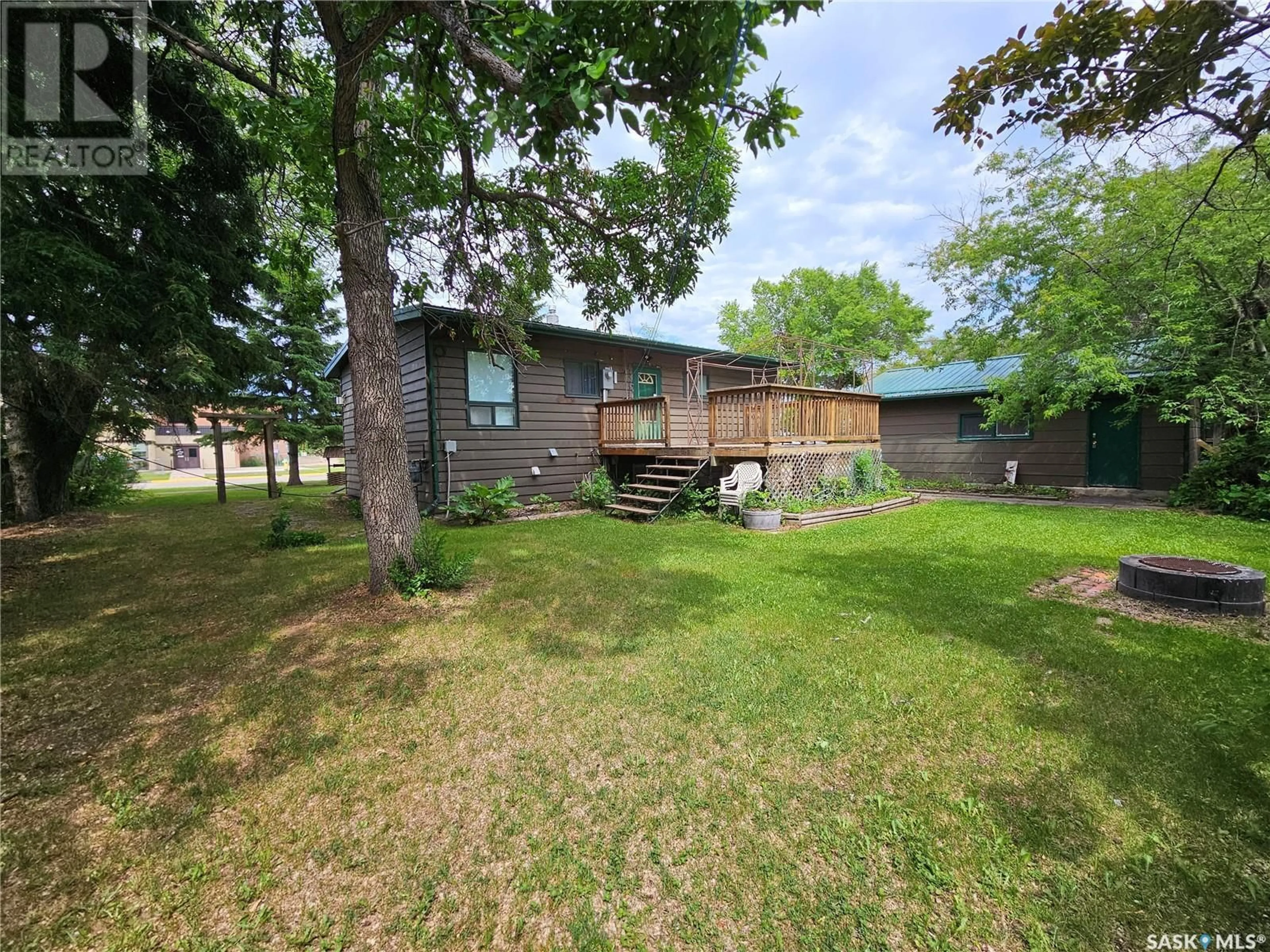 A pic from outside/outdoor area/front of a property/back of a property/a pic from drone, water/lake/river/ocean view for 508 5TH AVENUE, Meadow Lake Saskatchewan S9X1A9