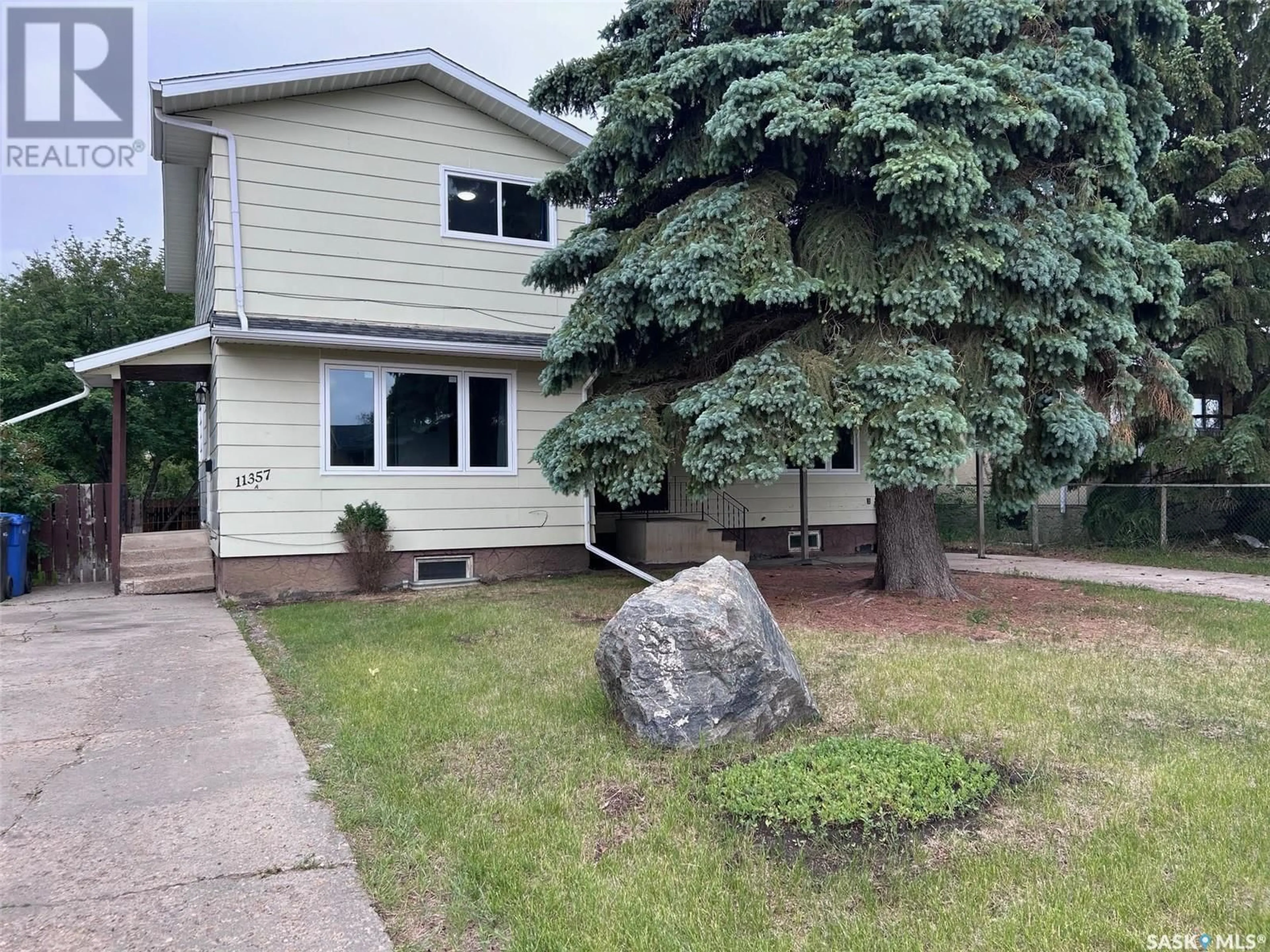 Home with vinyl exterior material, street for B - 11357 CLARK DRIVE, North Battleford Saskatchewan S9A3P6
