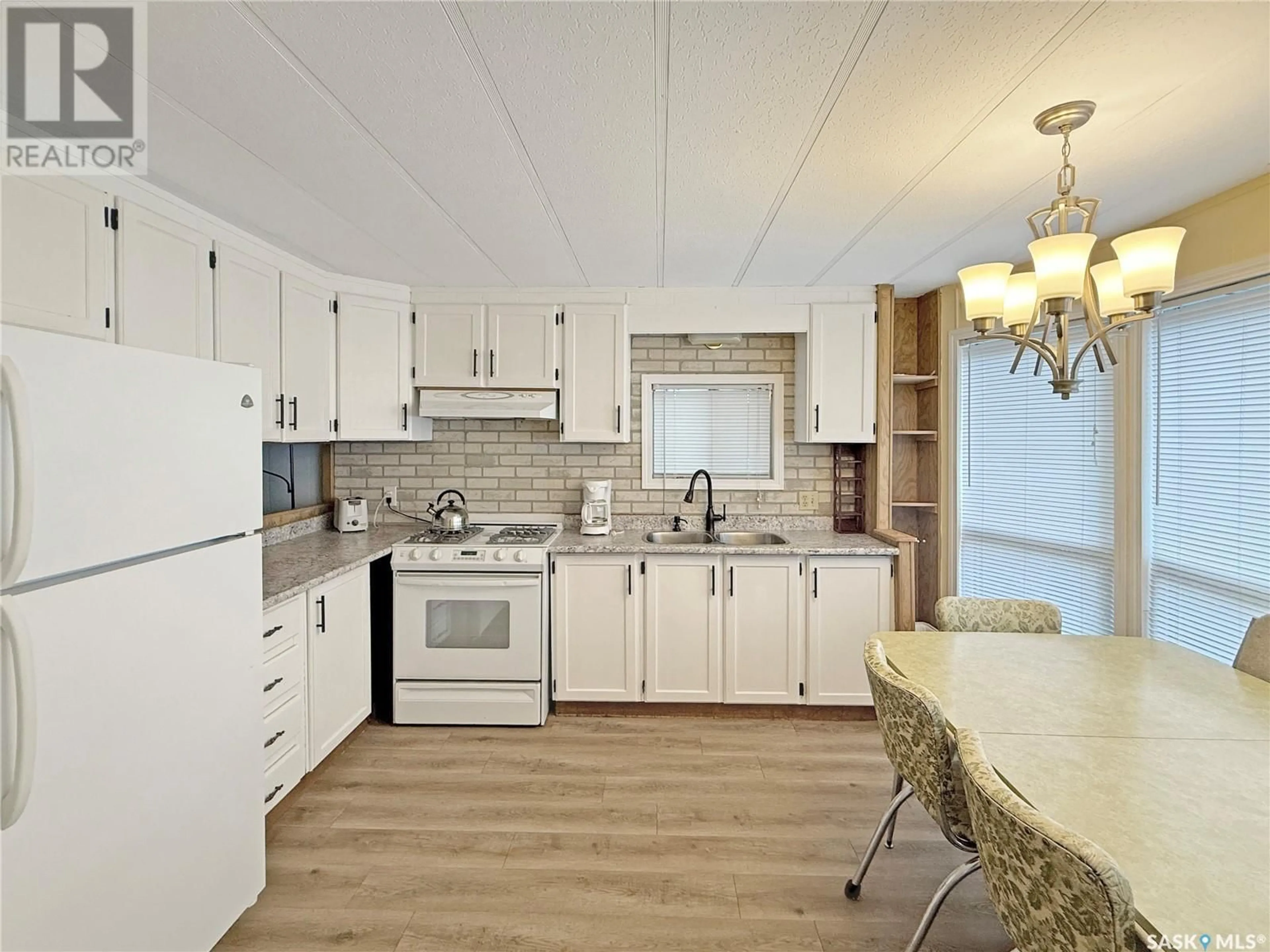 Open concept kitchen, unknown for 24 - 107 AMBROSE AVENUE, Lakeland Rm No. 521 Saskatchewan S0J0N0