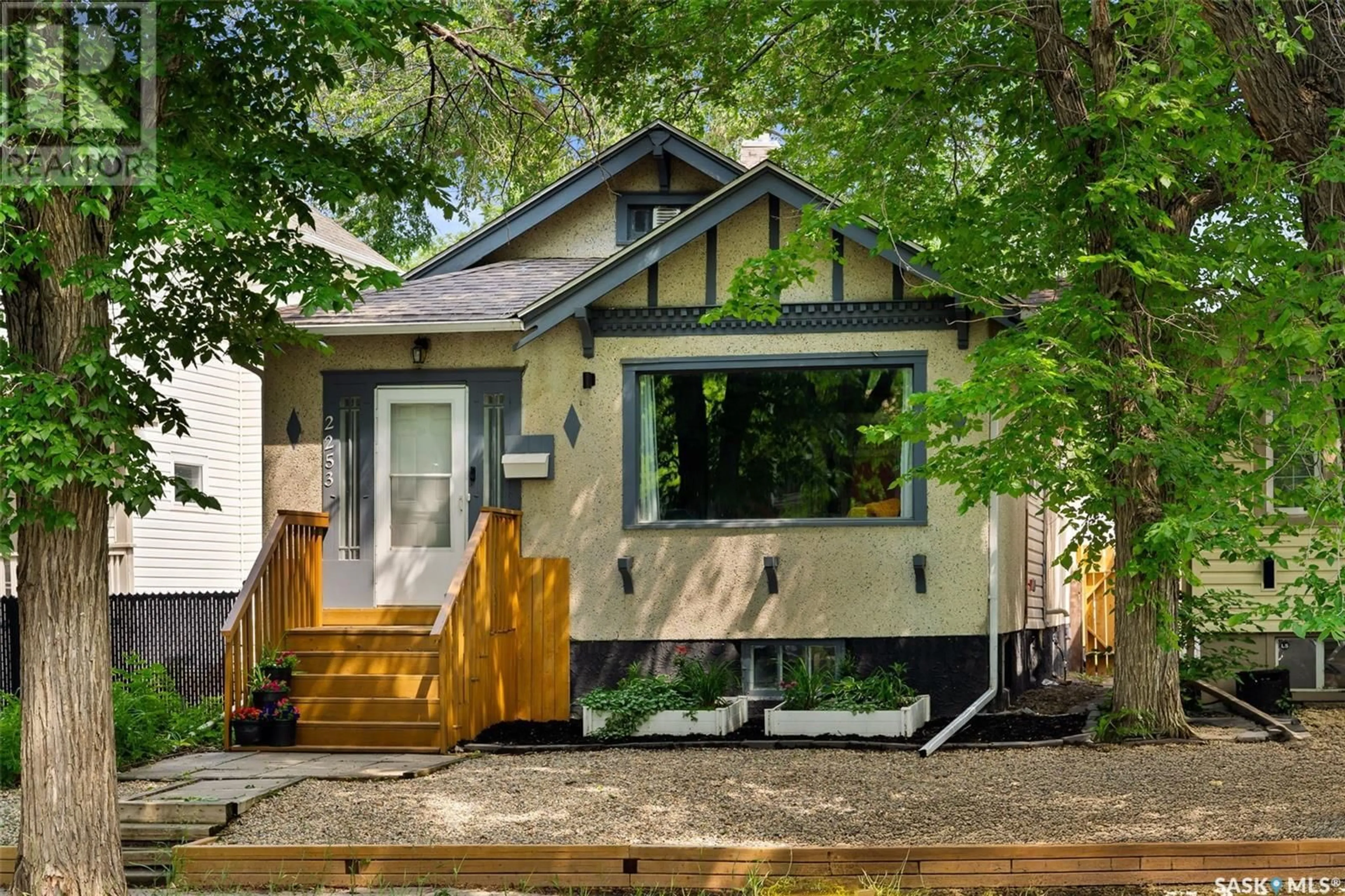 Home with vinyl exterior material, street for 2253 WINNIPEG STREET, Regina Saskatchewan S4P1H2