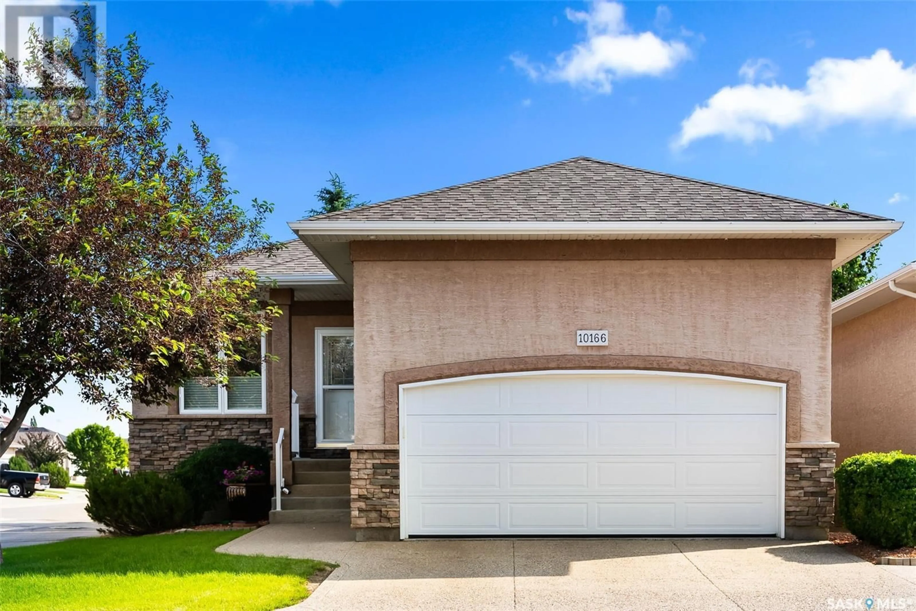 Home with brick exterior material, street for 10166 WASCANA ESTATES, Regina Saskatchewan S4V3E5