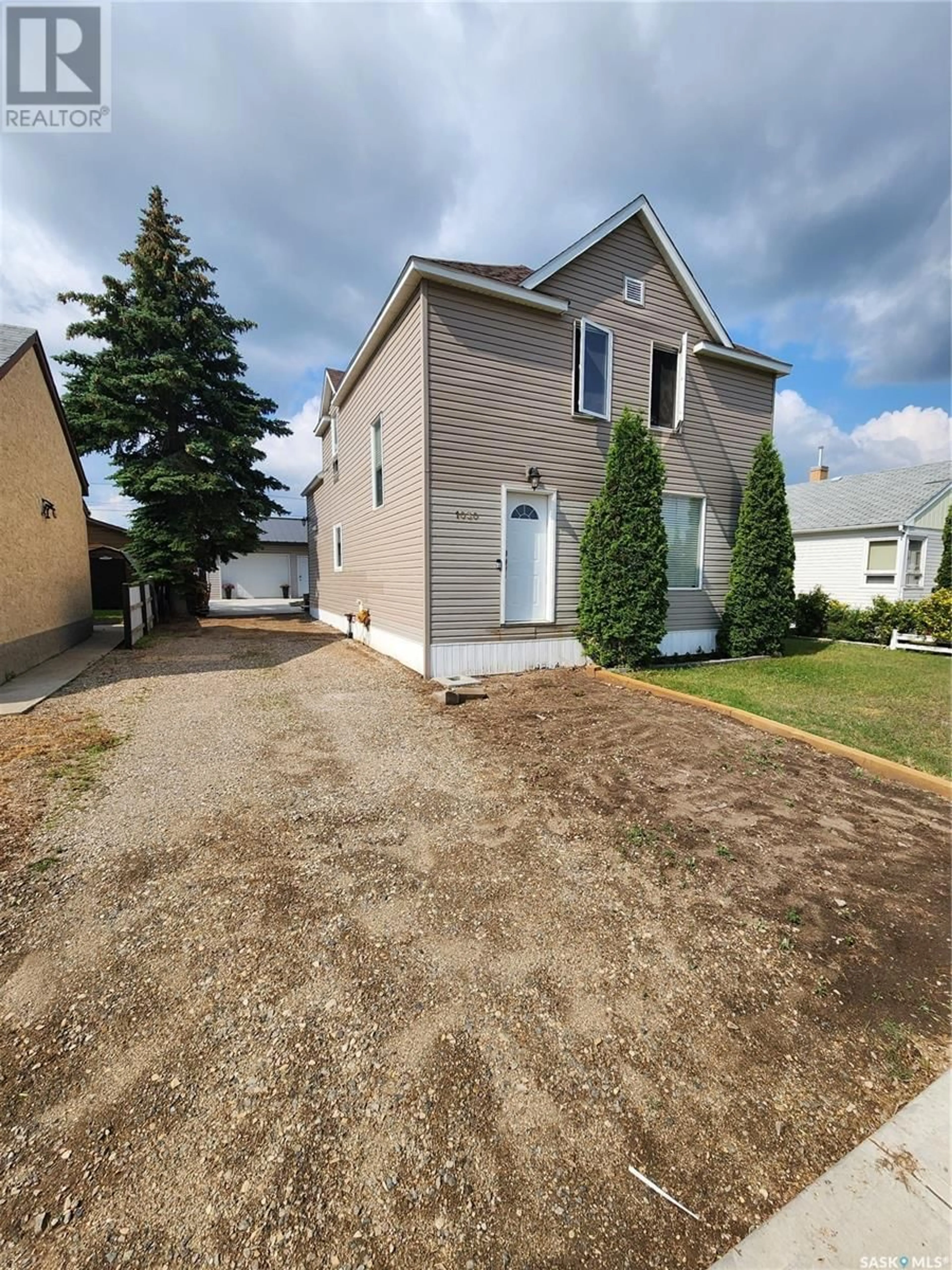 A pic from outside/outdoor area/front of a property/back of a property/a pic from drone, street for 1030 3RD STREET, Estevan Saskatchewan S4A0R5