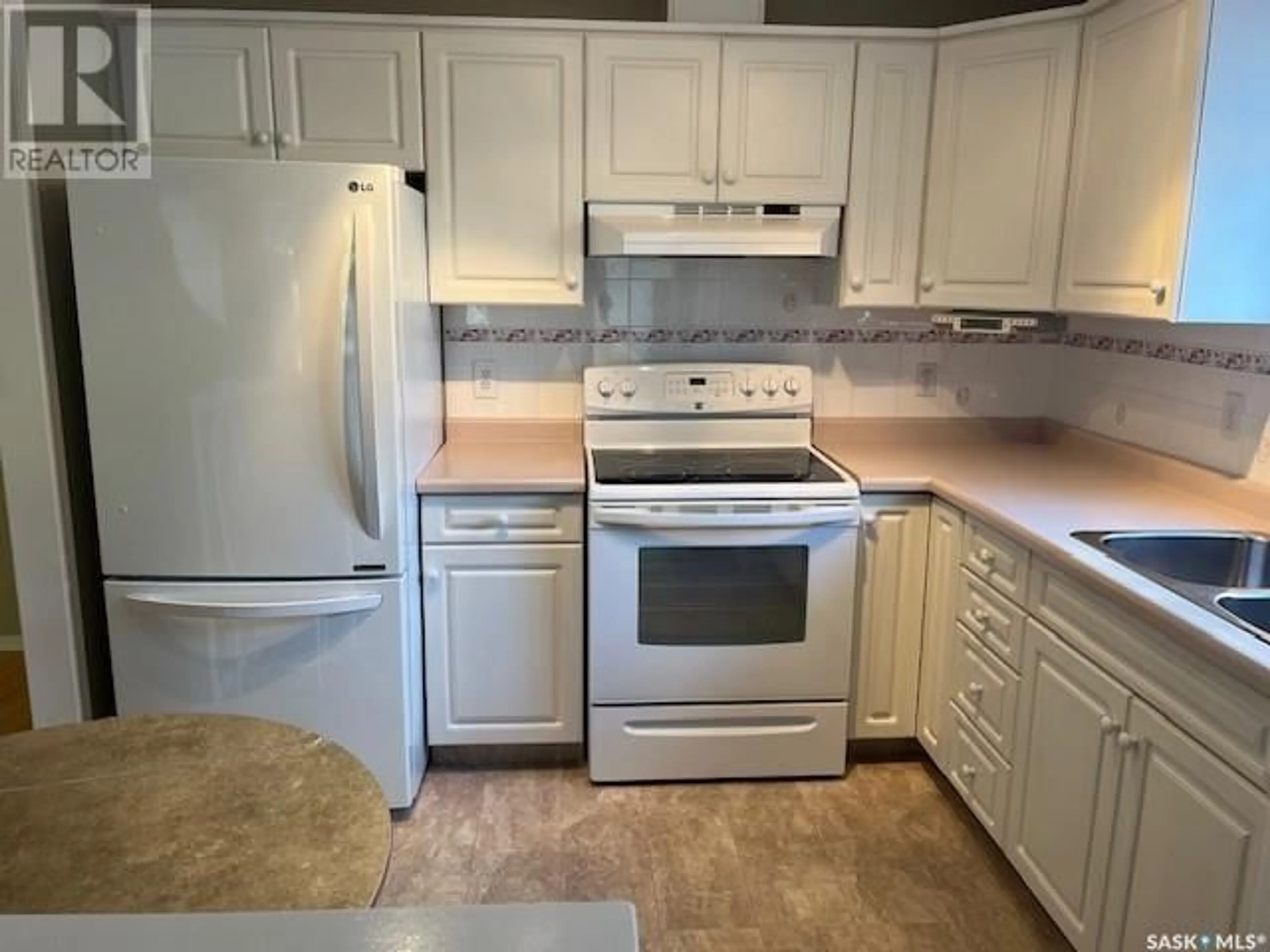 Standard kitchen, ceramic/tile floor for 207 - 521 MAIN STREET, Saskatoon Saskatchewan S7N0C2