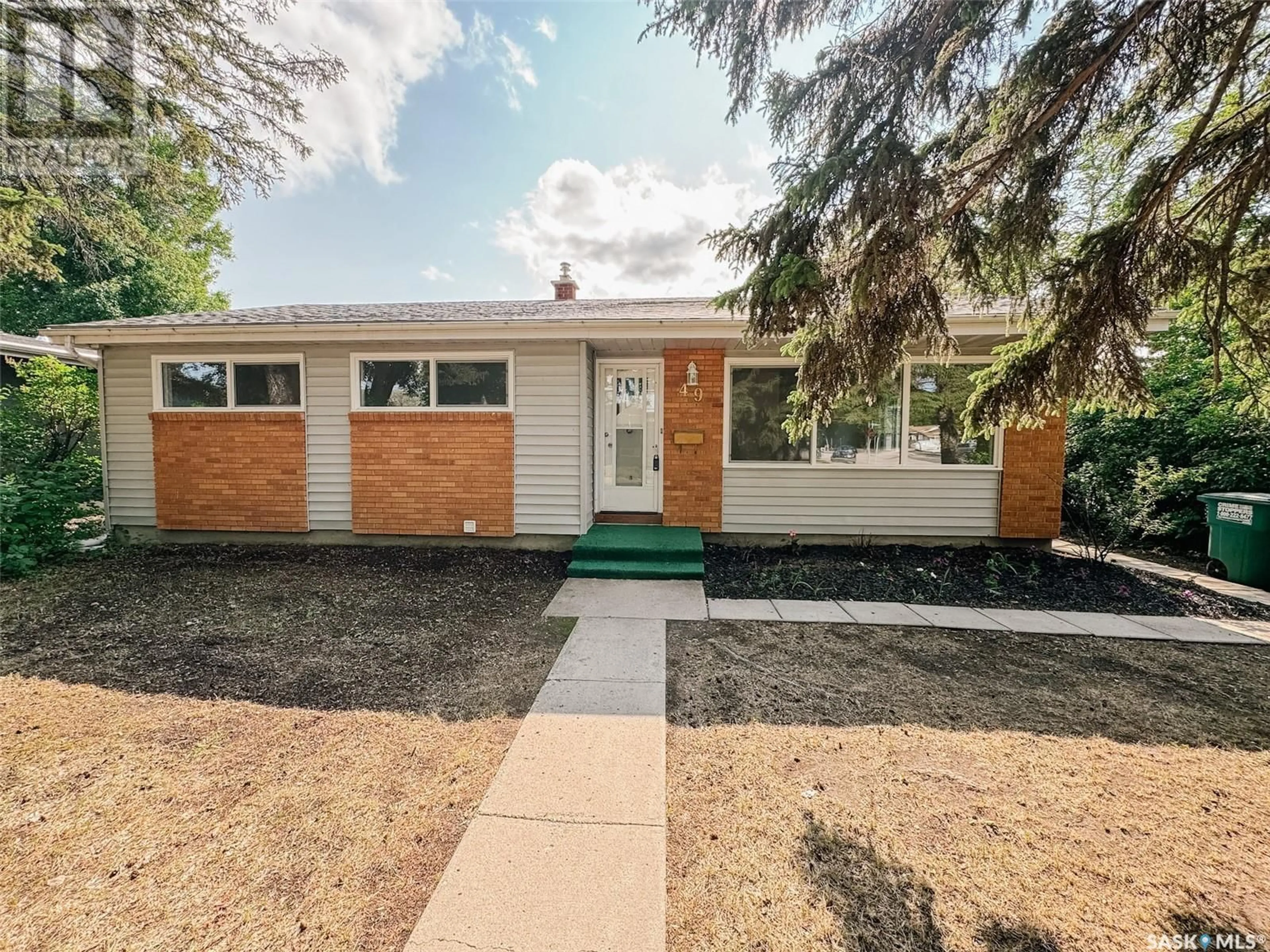 Home with vinyl exterior material, street for 49 RUTTER CRESCENT, Saskatoon Saskatchewan S7H3B6