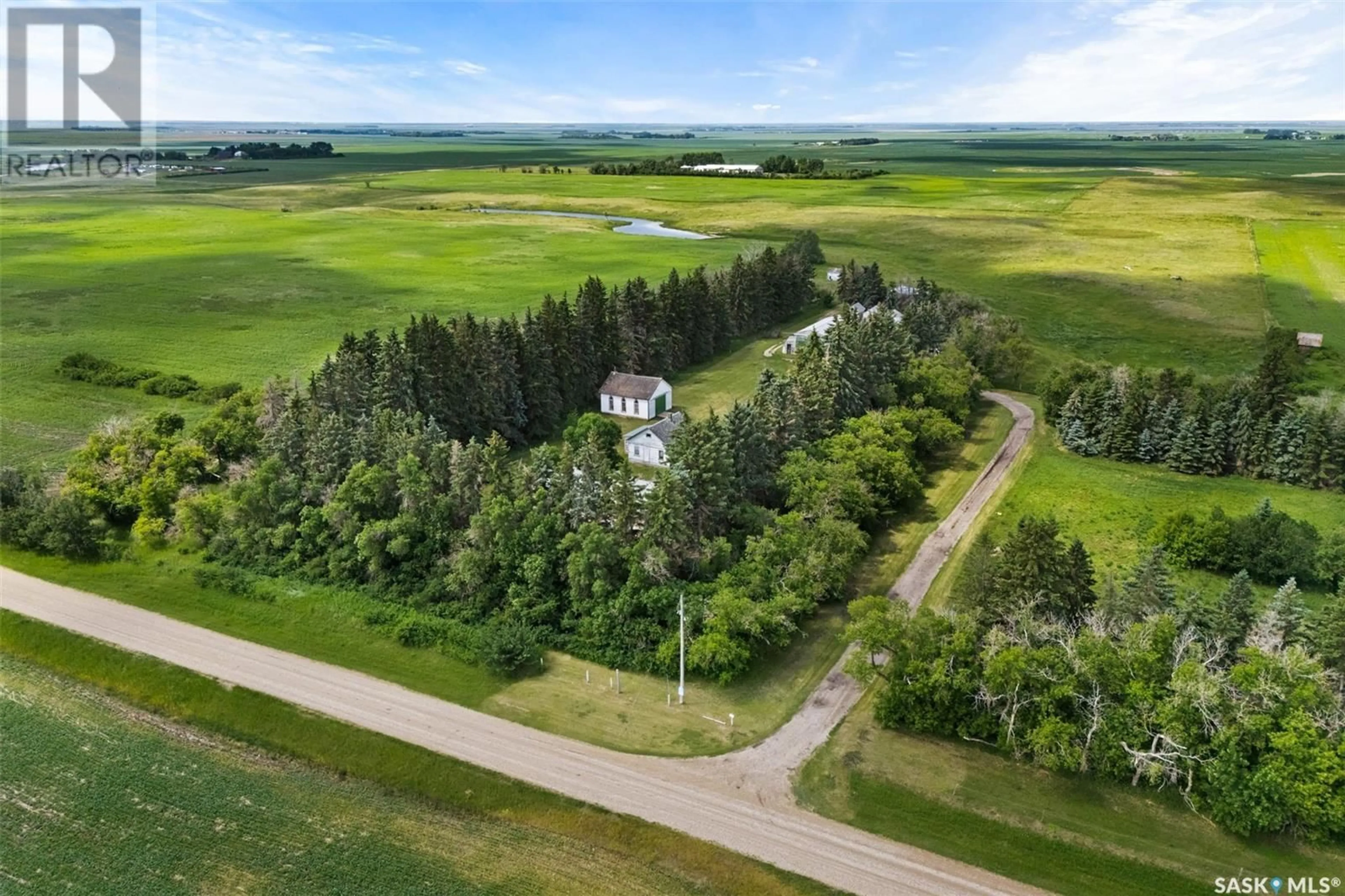 A pic from outside/outdoor area/front of a property/back of a property/a pic from drone, water/lake/river/ocean view for 149 MCTIGHE ACREAGE ACREAGE, Lumsden Rm No. 189 Saskatchewan S0G0C7