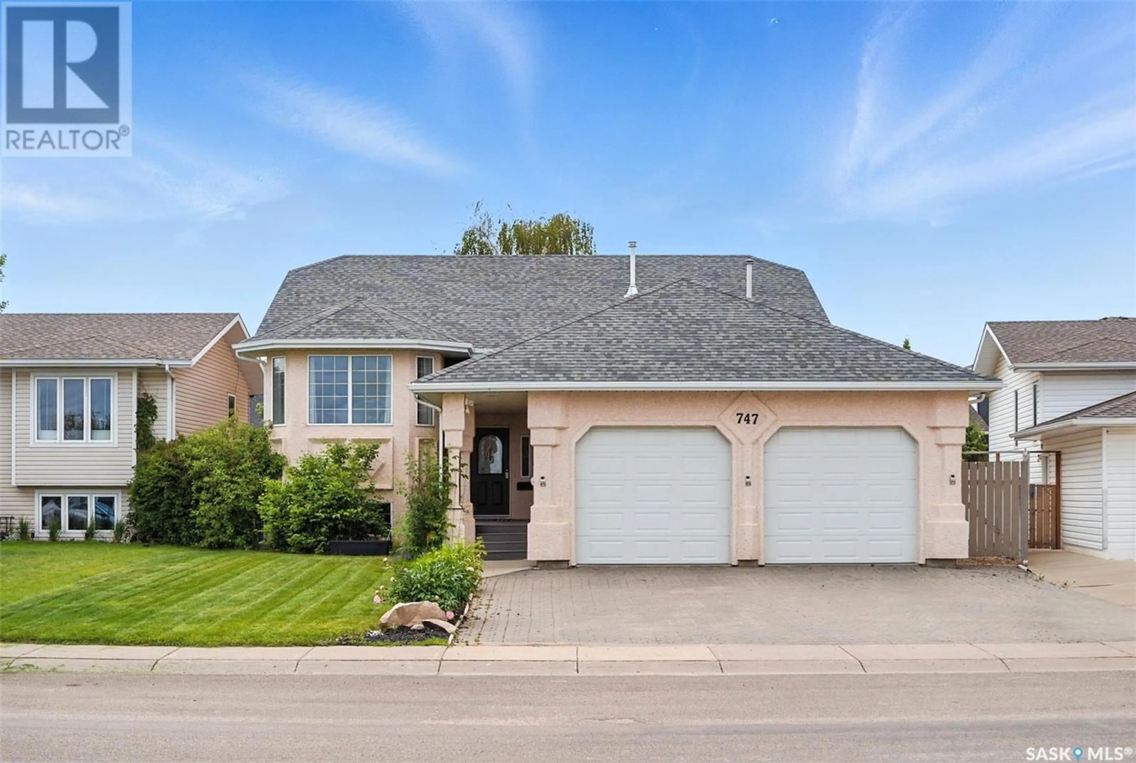Home with brick exterior material, street for 747 KONIHOWSKI ROAD, Saskatoon Saskatchewan S7S1K1