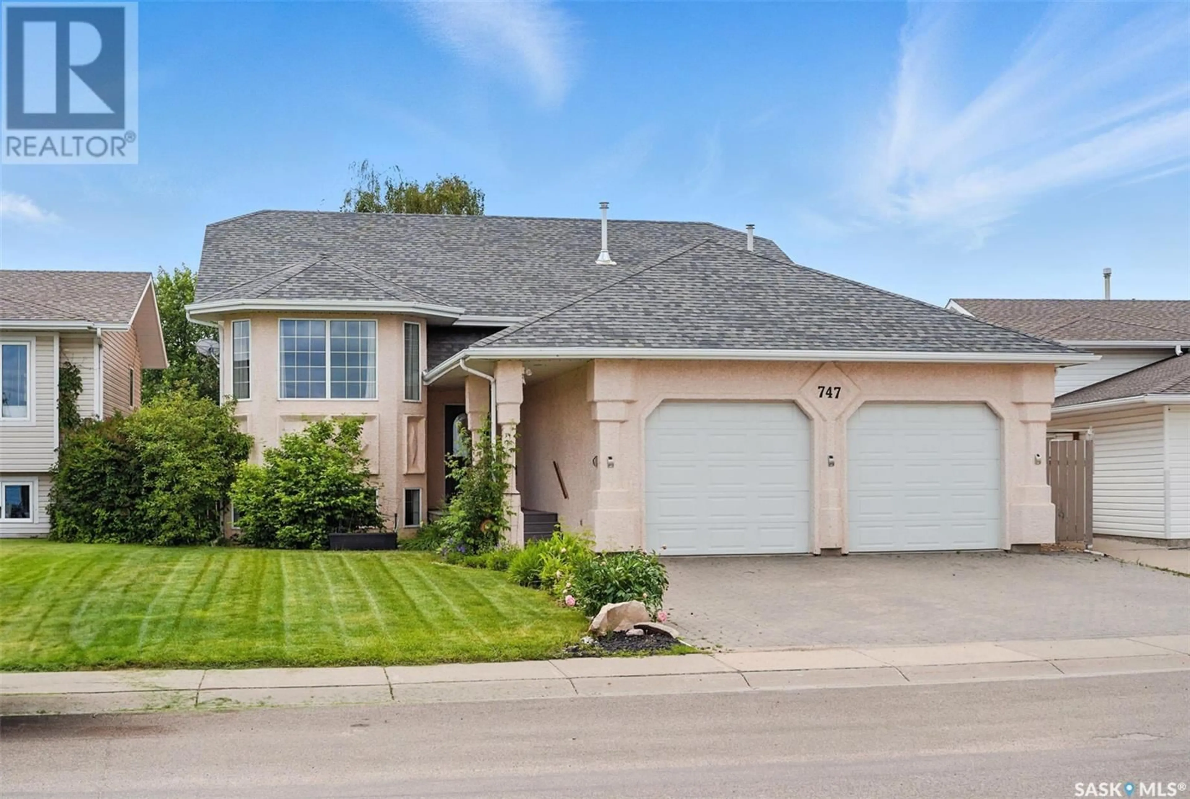 Home with brick exterior material, street for 747 KONIHOWSKI ROAD, Saskatoon Saskatchewan S7S1K1