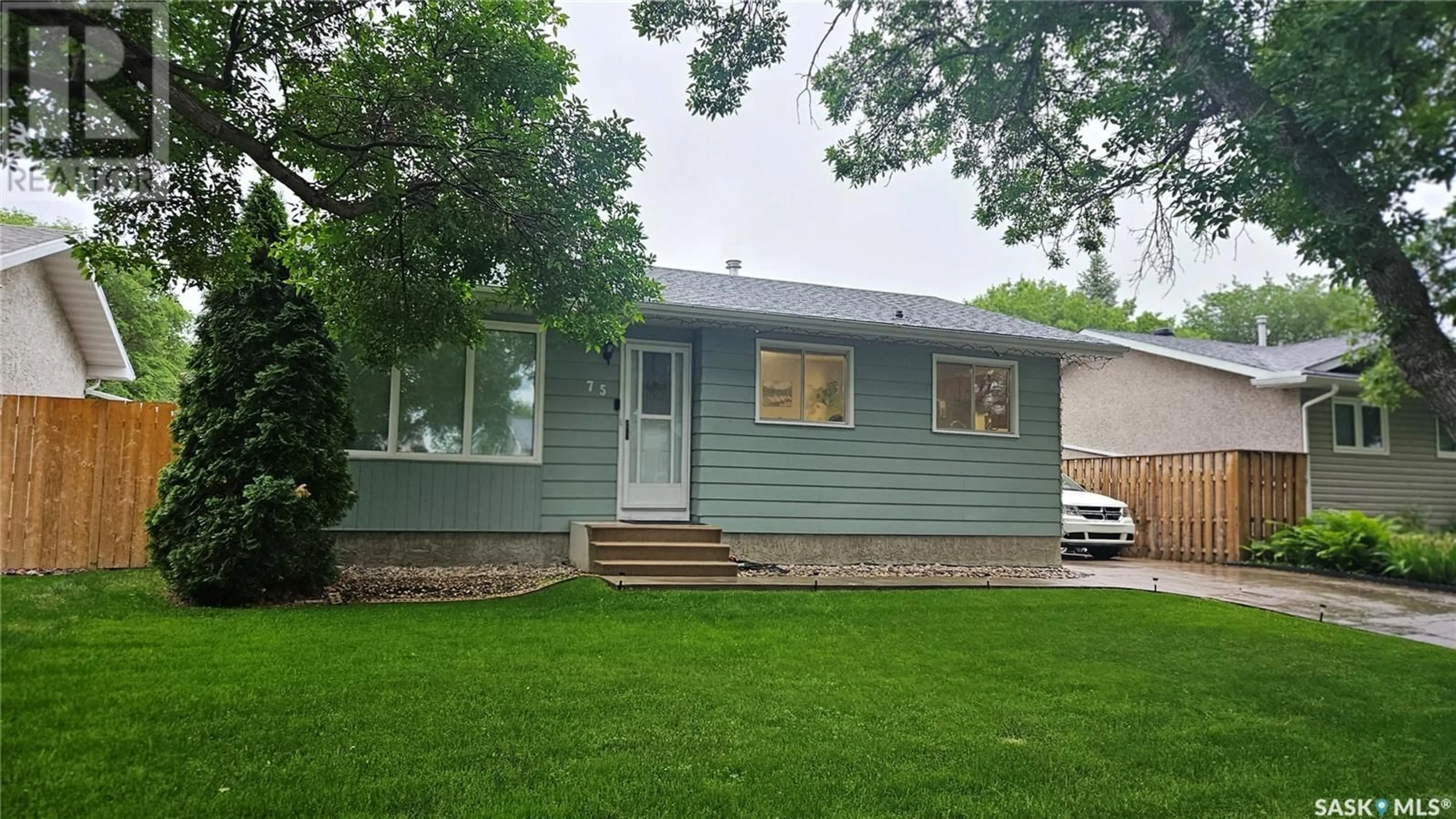 Home with vinyl exterior material, street for 75 WALTER CRESCENT, Regina Saskatchewan S4X1L5