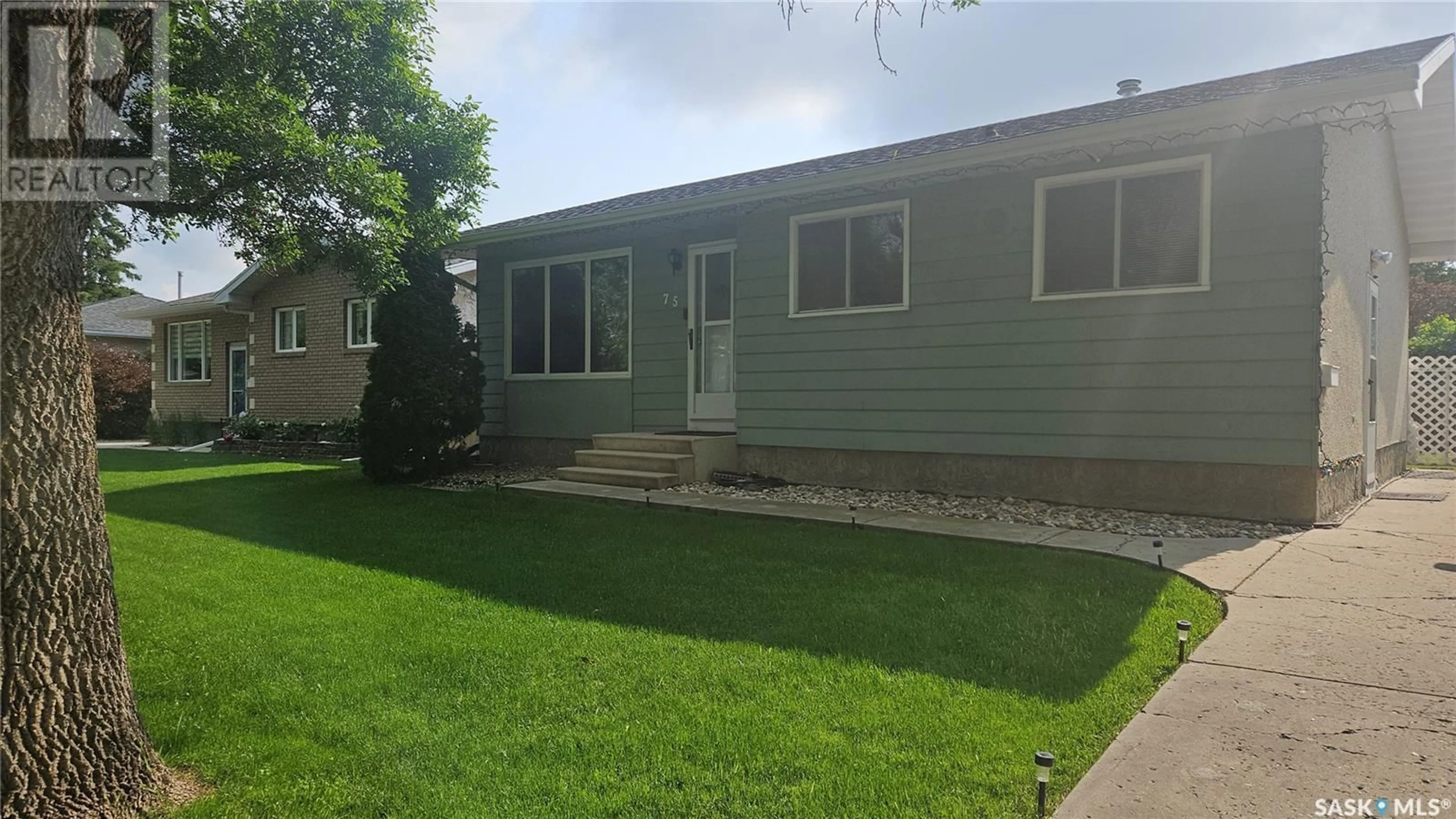 Home with vinyl exterior material, street for 75 WALTER CRESCENT, Regina Saskatchewan S4X1L5