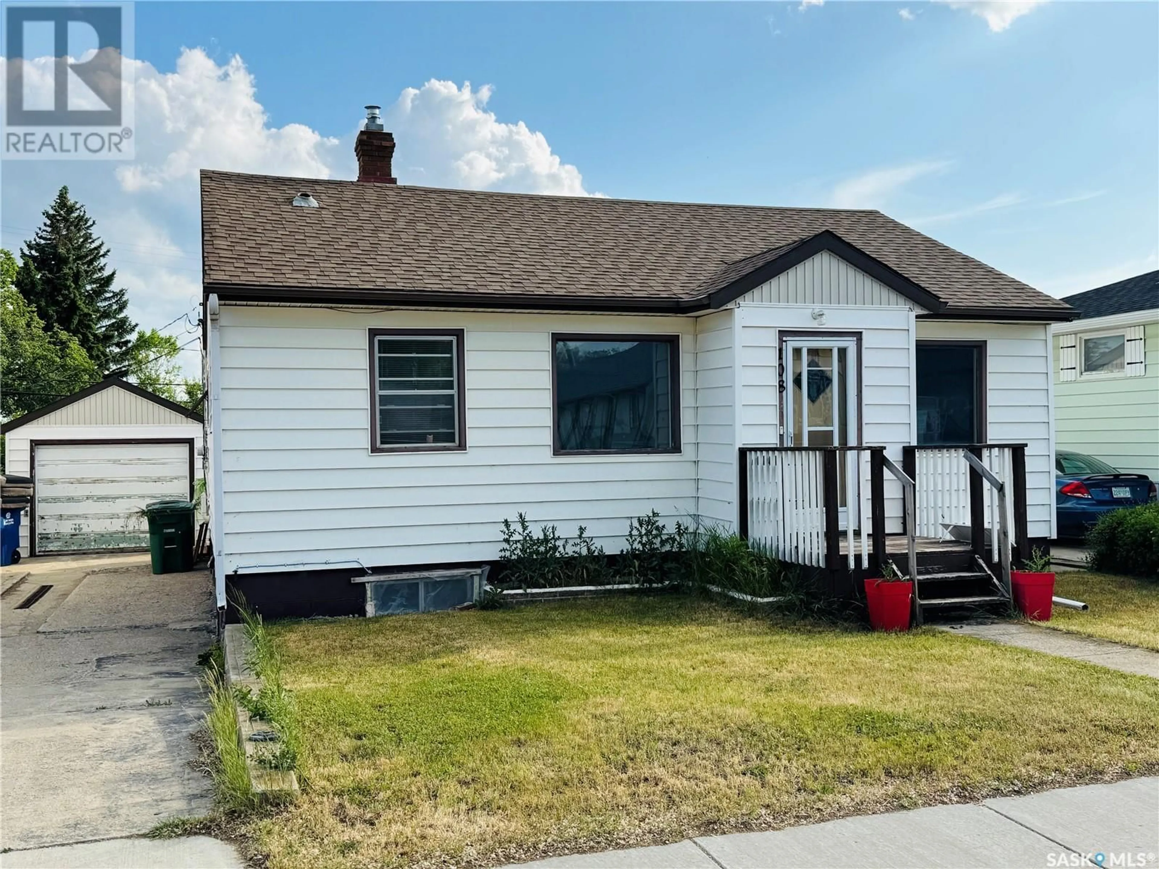 Home with vinyl exterior material, street for 108 7TH AVENUE, Biggar Saskatchewan S0K0M0