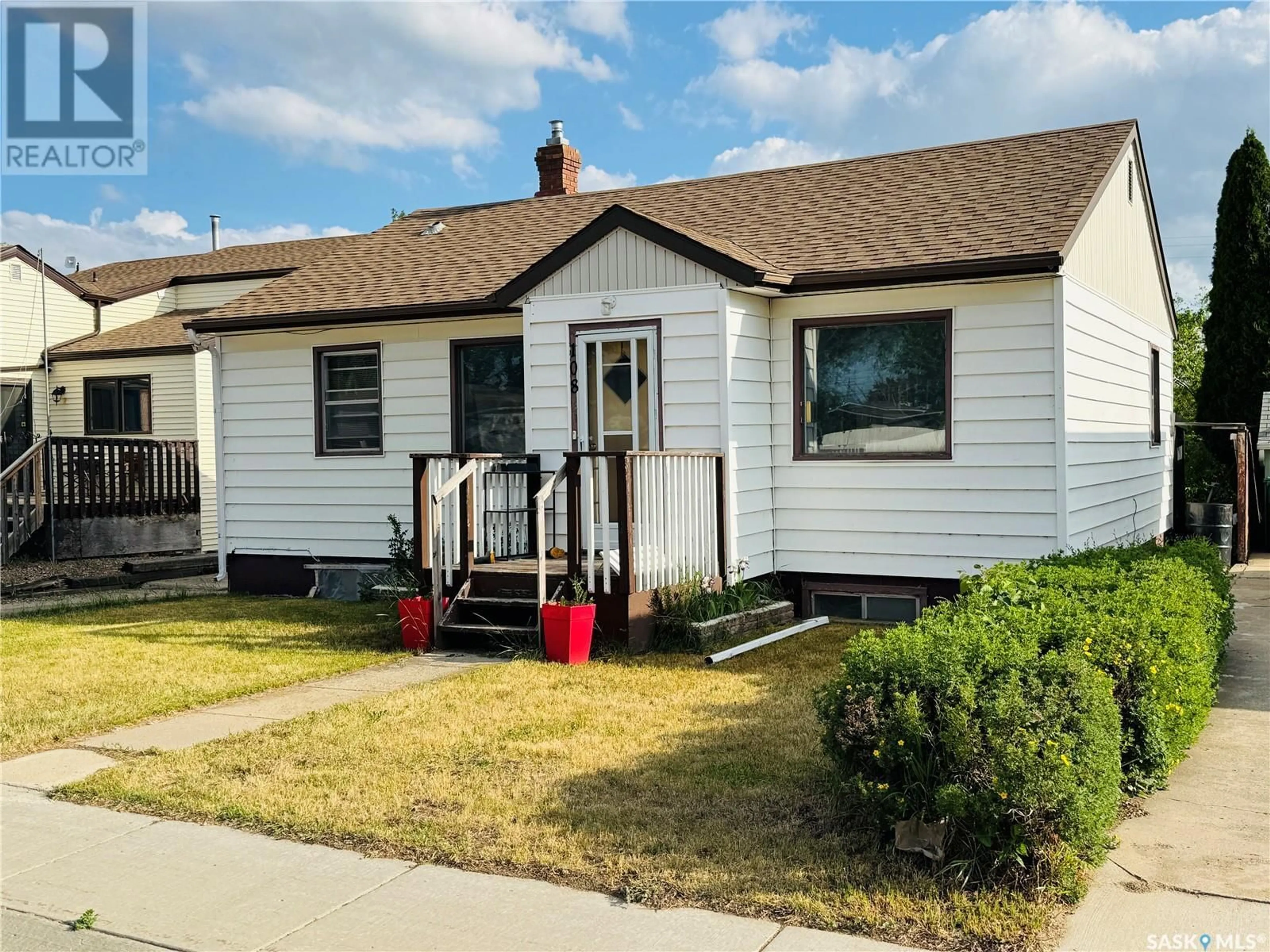 Home with vinyl exterior material, street for 108 7TH AVENUE, Biggar Saskatchewan S0K0M0