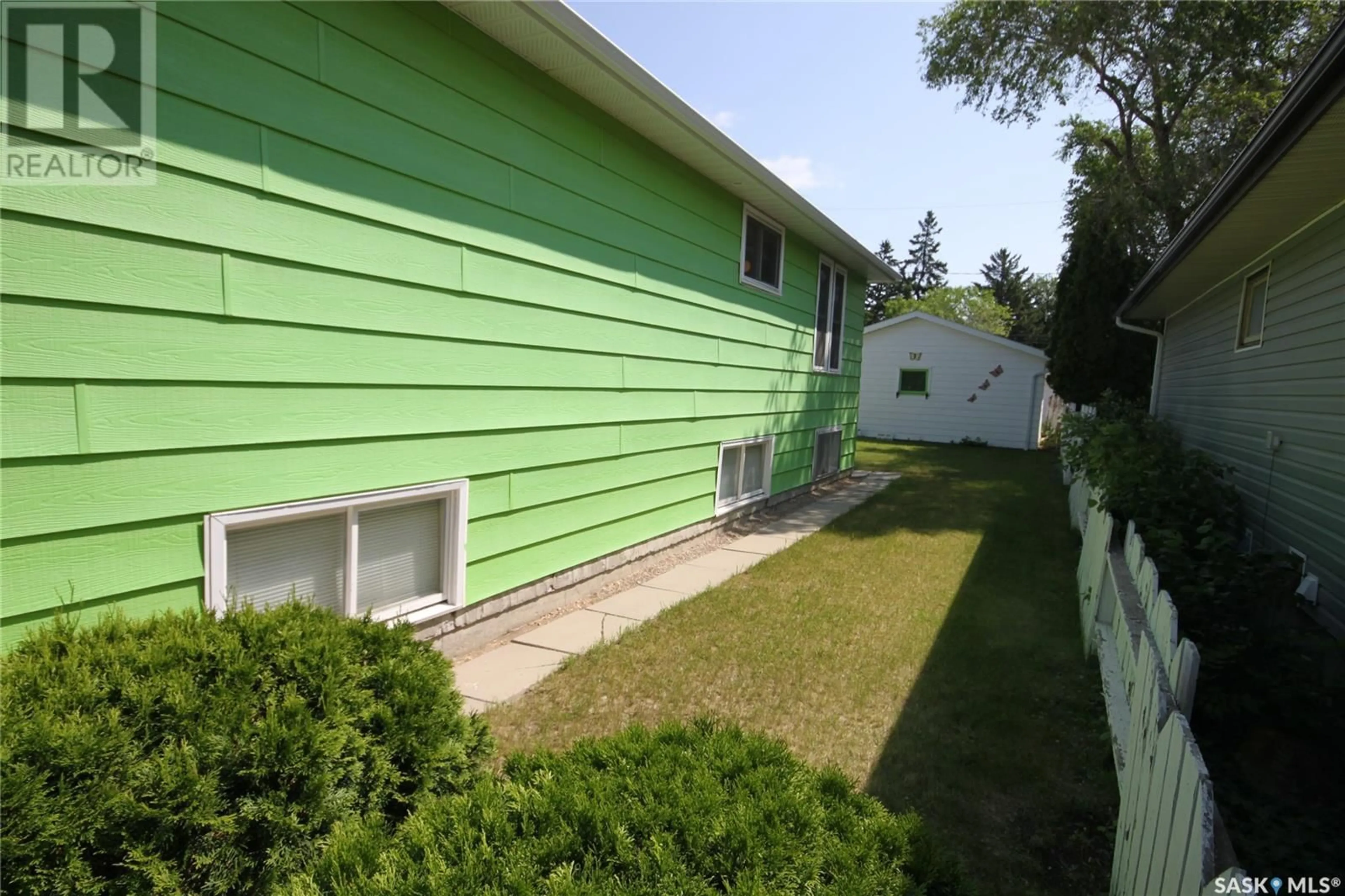 Home with vinyl exterior material, street for 157 MCINTYRE STREET, Regina Saskatchewan S4R3B6