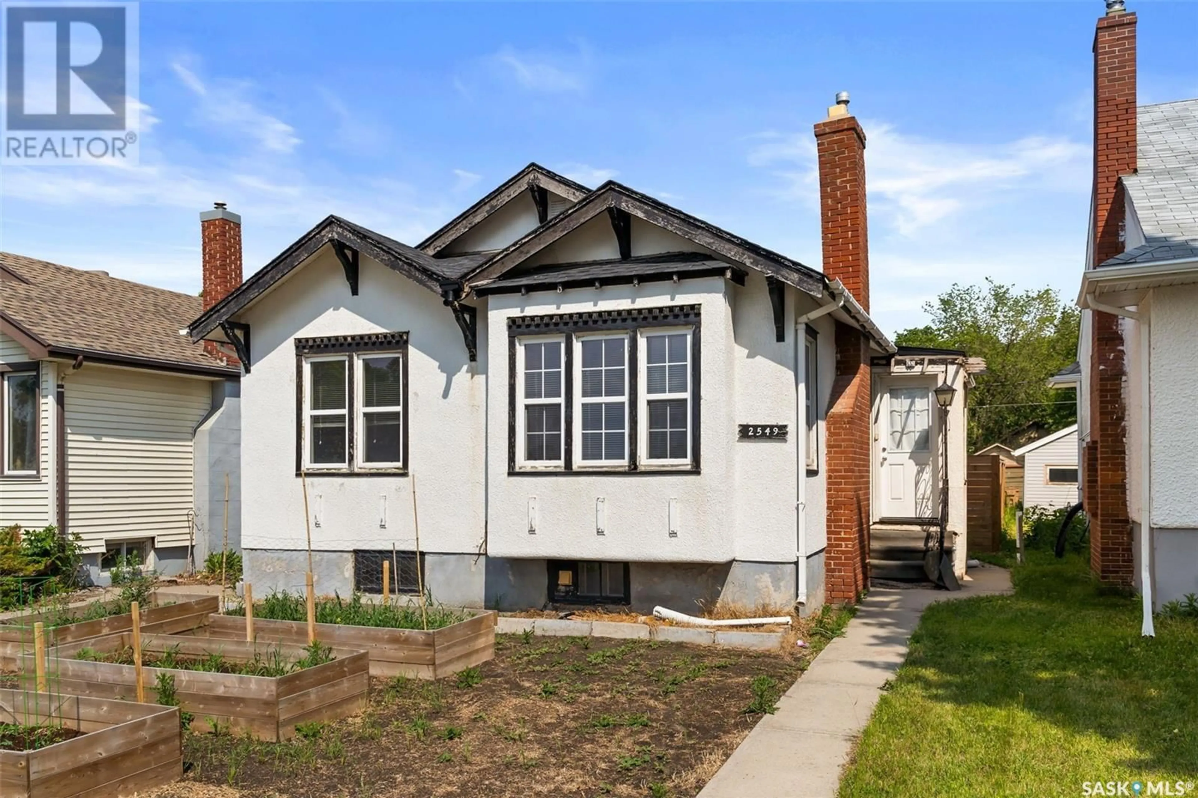 Home with brick exterior material, street for 2549 WINNIPEG STREET, Regina Saskatchewan S4P1H6